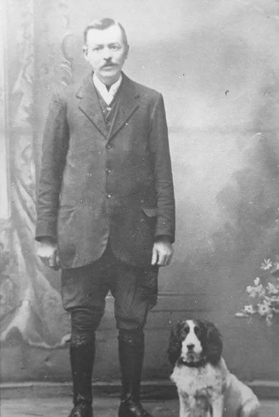 Mr Anstell, Land Agent to Mary Bouverie and his spaniel