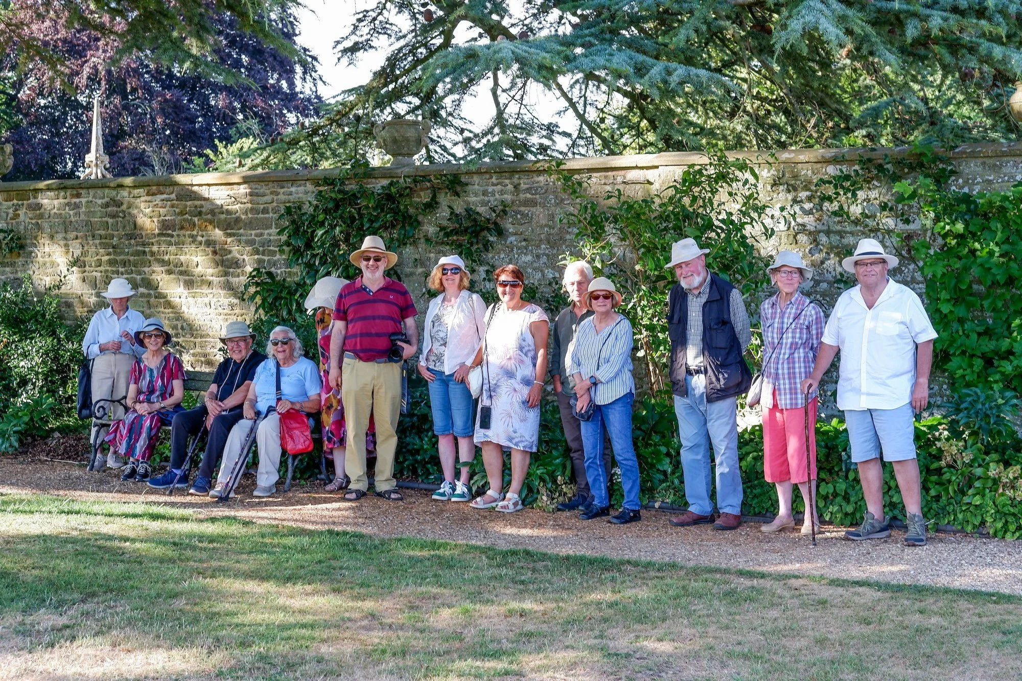 Members on a guided tour of Canons Ashby Gardens