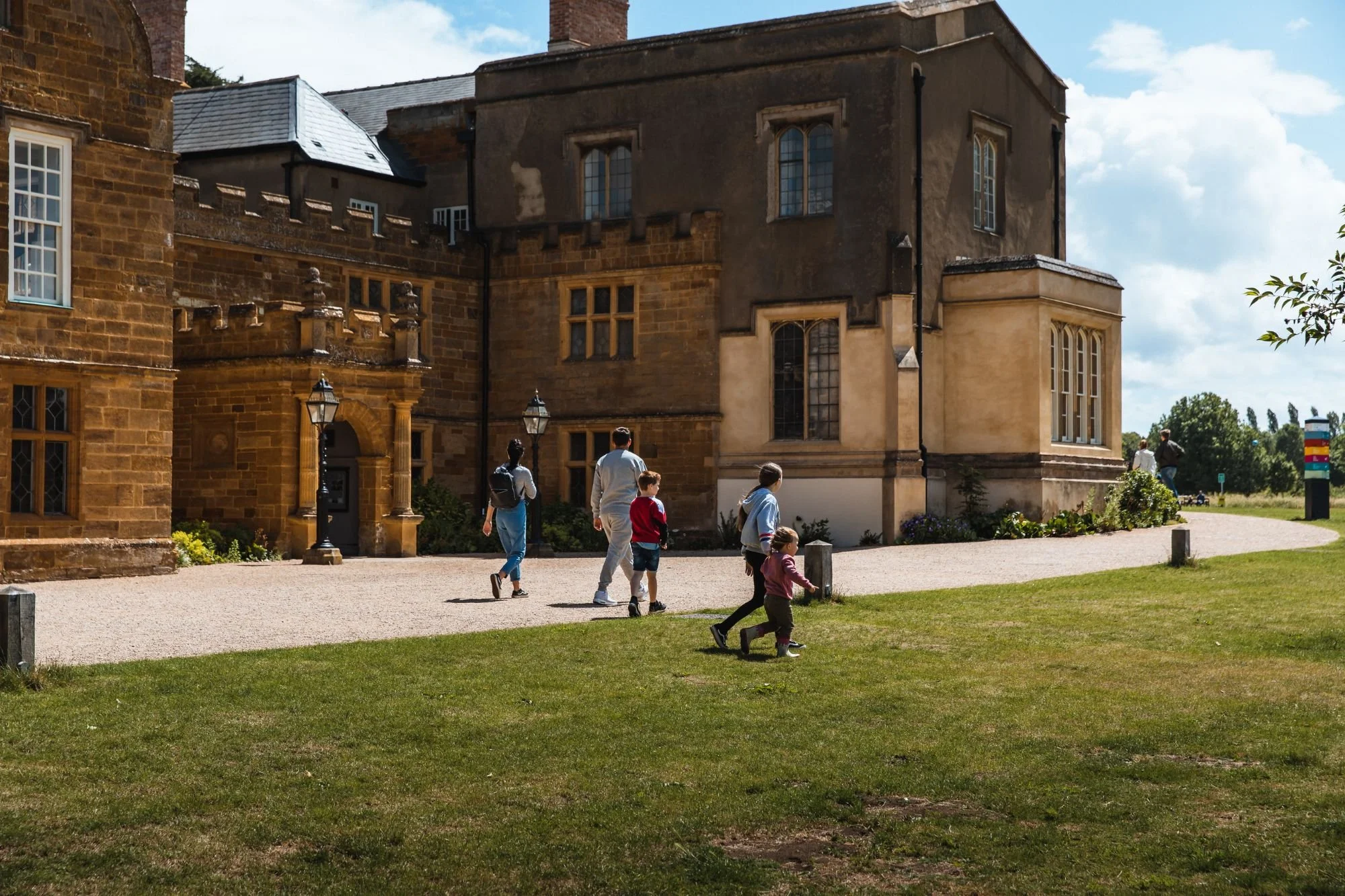 Delapre Abbey visitors coming up the path