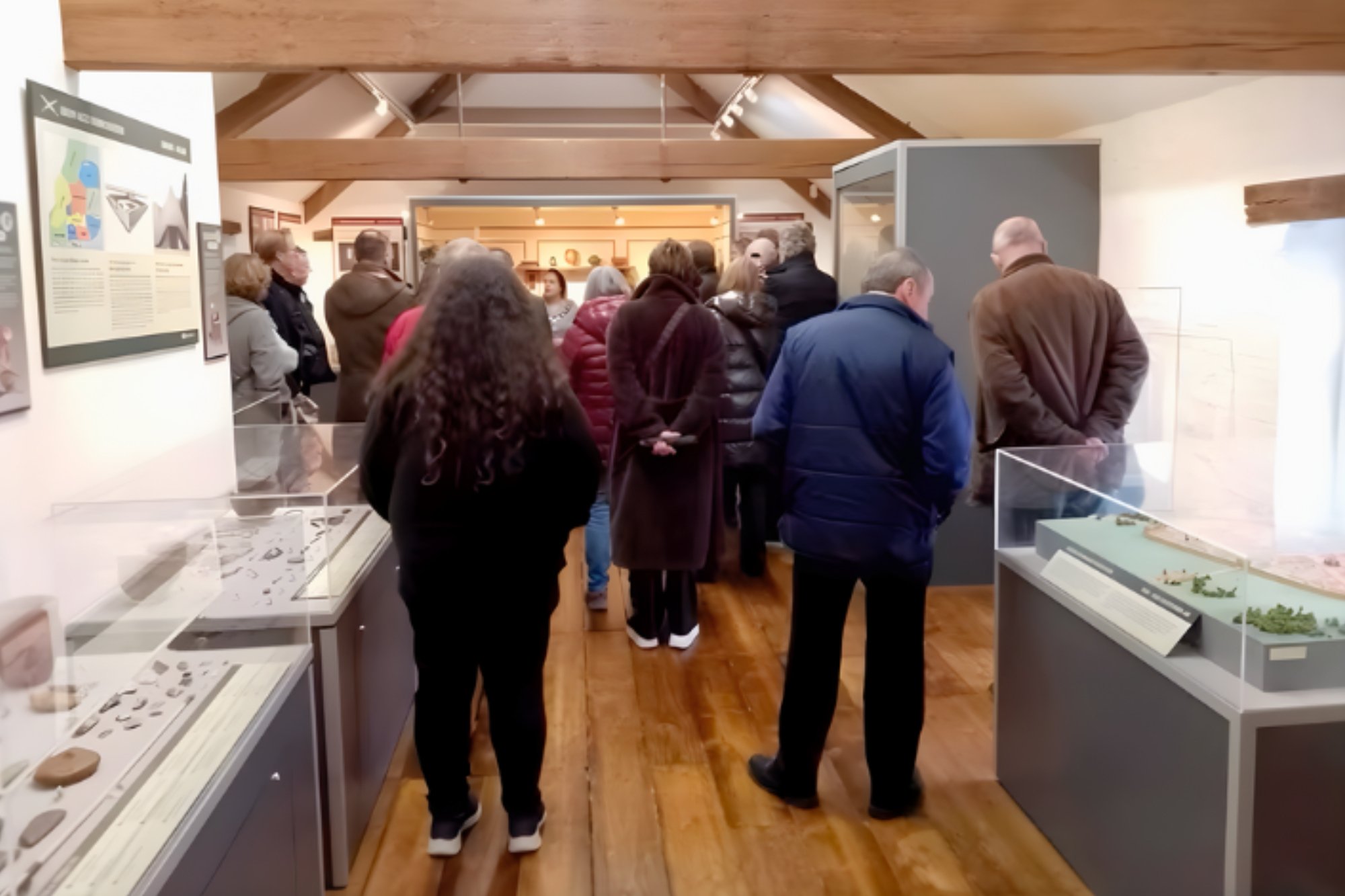 Group visiting the museum listening to a speaker