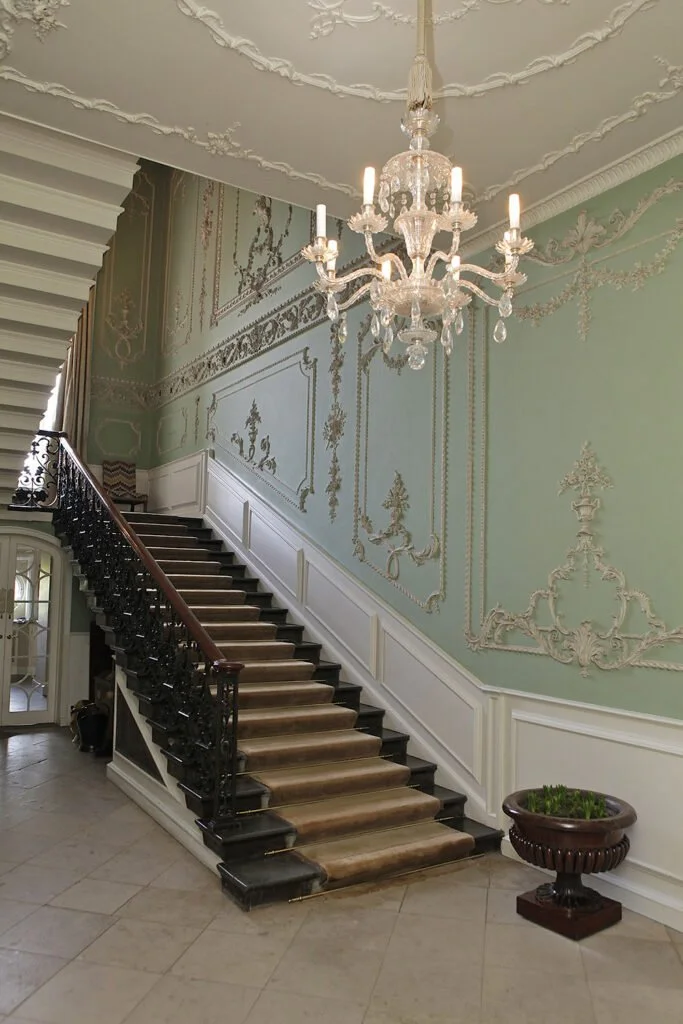 One of the staircases close to a candlebra