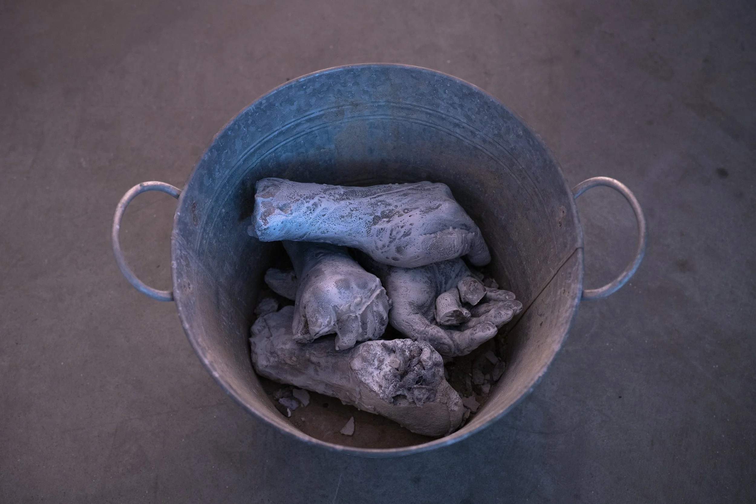 Bucket |  | aluminum, concrete, wax.  Photographed by Joel Tsui