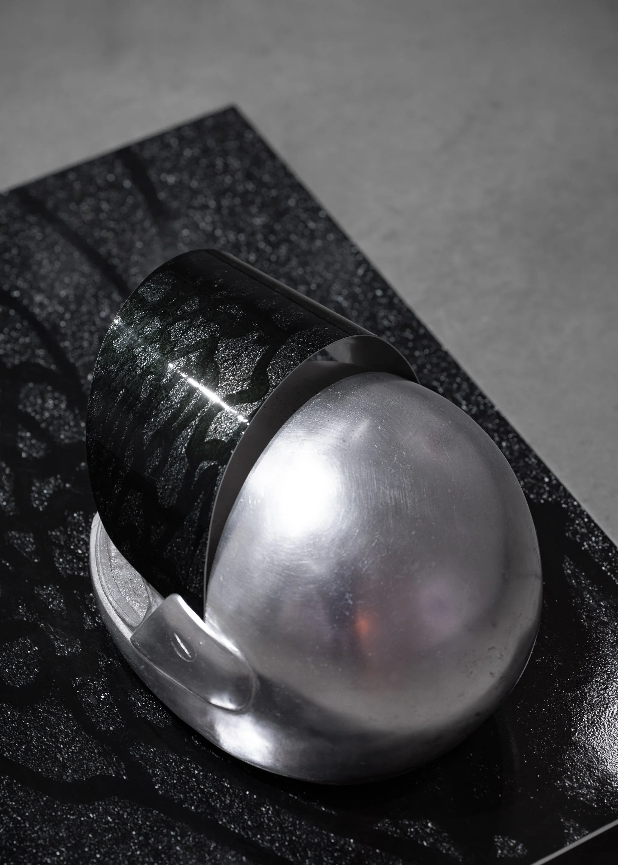 Black Mirror - top detail | cast aluminum, dye-sublimation and inkjet print | Photographed by Joel Tsui