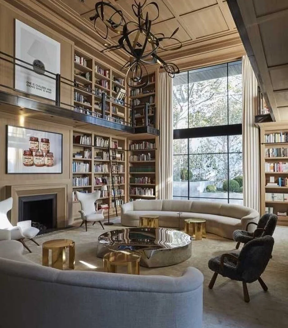 Time to relax and read!
Never stop learning, it is good for you mentally and emotionally.
See how the curved sofas help to visually soften the space which is composed with many many straight lines. Adding curved lines in any space helps soften the ri