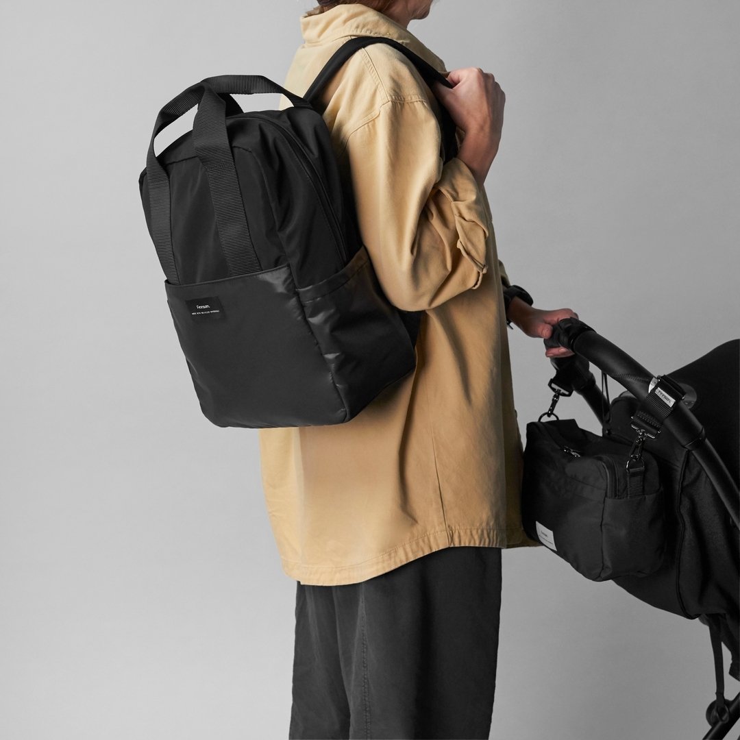 Introducing Lars: The Ultimate Unisex Changing Backpack! 

Designed for modern parents who mean business, Lars is here to make your life easier. 

With its sleek unisex design, Lars is perfect for mums and dads on the move. Featuring a laptop sleeve 