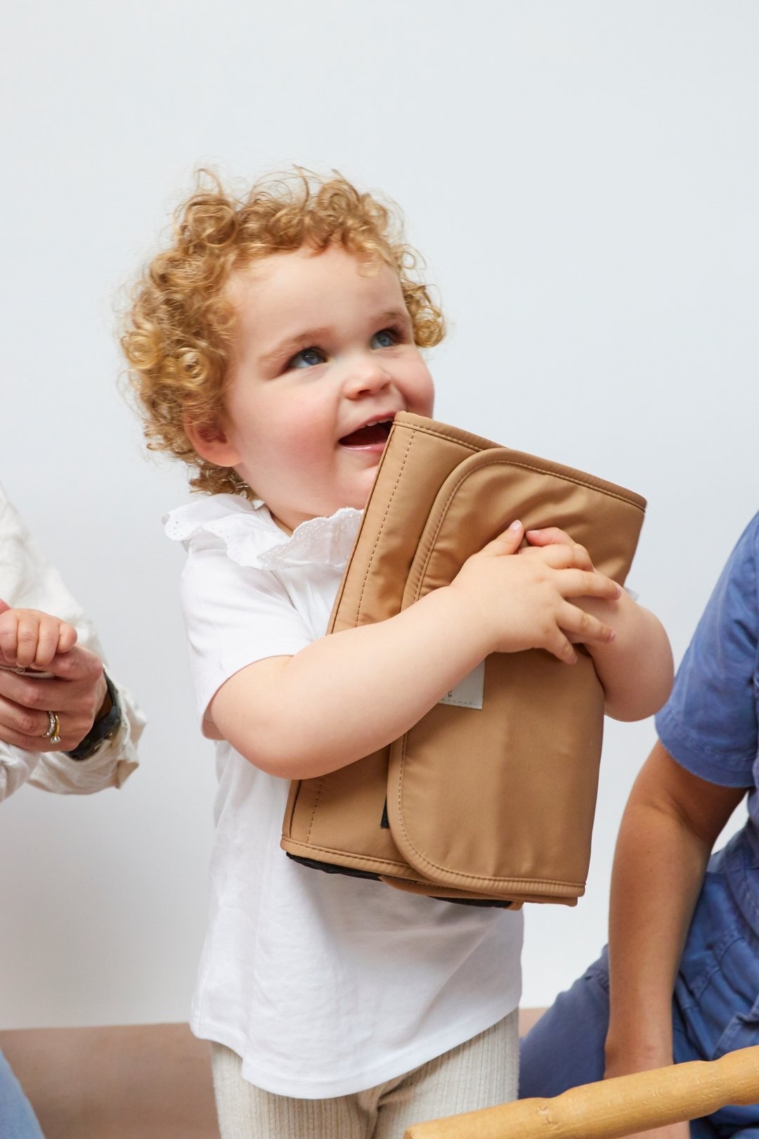 You're out and about with your little bundle of joy, and suddenly it's time for a diaper change. No need to panic, MAGGIE is the perfect changing mat to have on-the-go!

Designed by mums for other mums (and dads), it includes two handy pockets for na