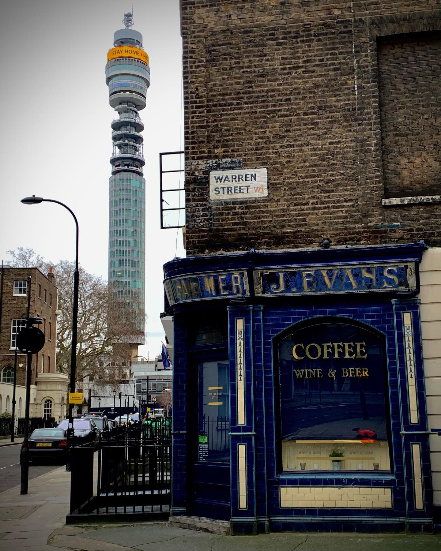 J.Evans Dairy Farmer Warren Street Fitzrovia London W1 - building built in 1793 and shopfront added around 1916. Behind is the Post Office Tower as it was known when built in 1964 #londonarchitecture #fitzrovia #londonstreets #londonlife #londonwalks