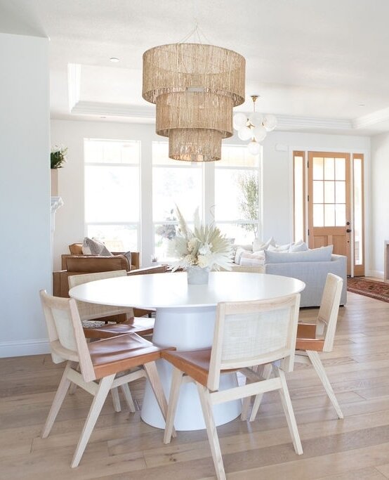 Lighting Tips: Hanging lights over a round dining table:⁠
⁠
1) Make sure your light is 30-36&quot; above your surface⁠
⁠
2) To create balance, the width of your light should be around 50-75% of the diameter of your table. ⁠
⁠
3) I suggest investing i