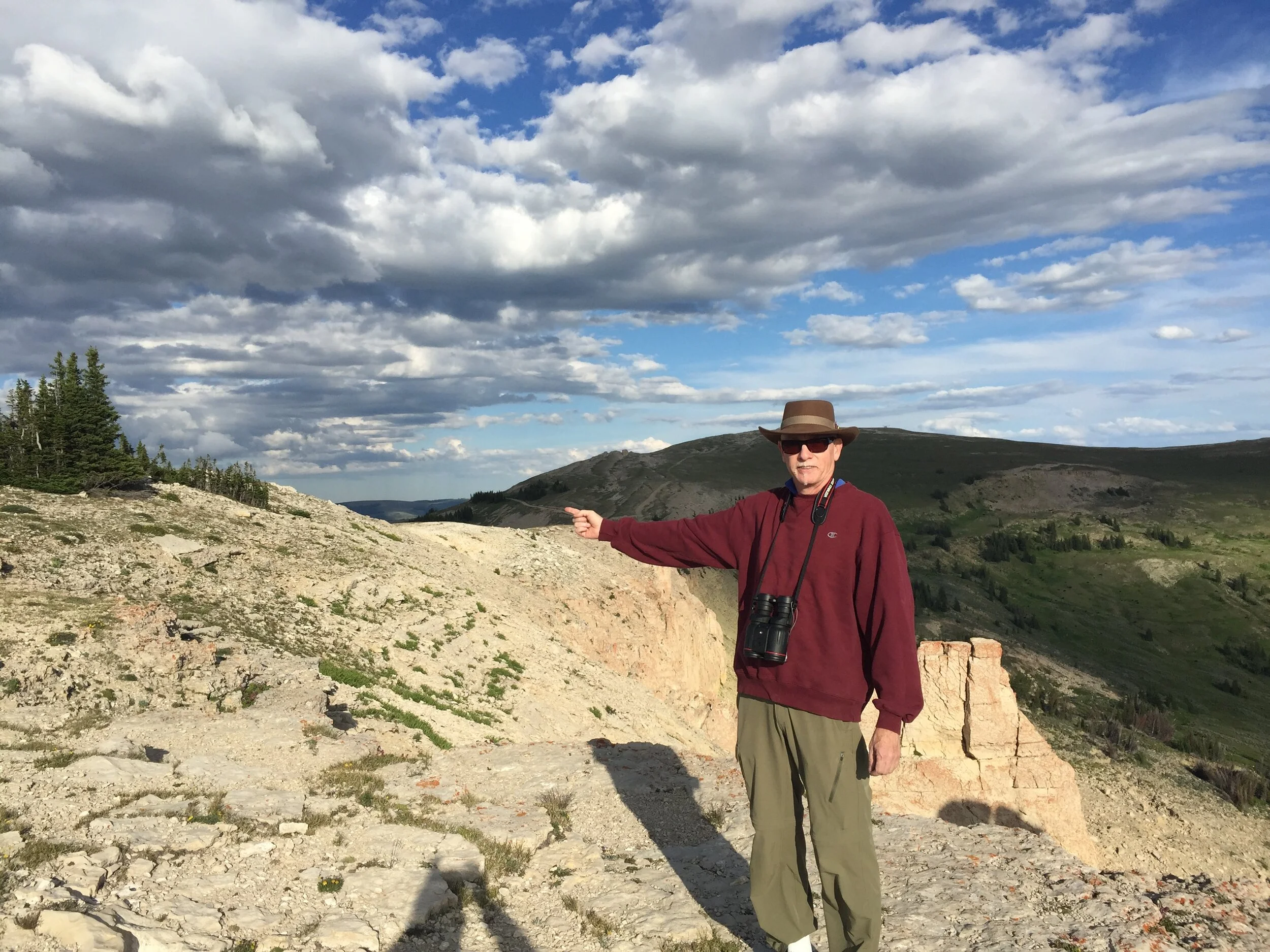 Look close, My finger marks the mountain road Medicine Wheel