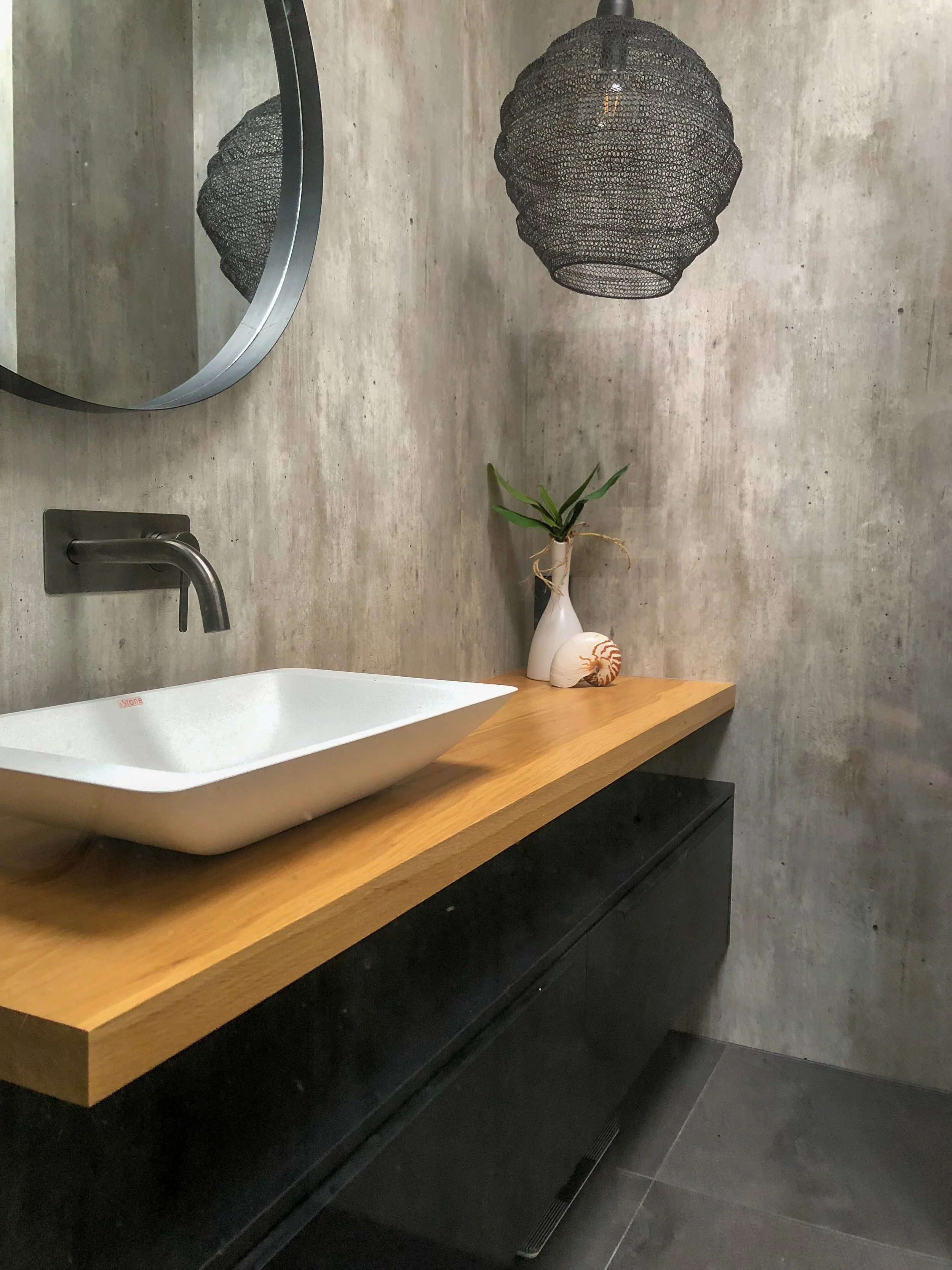 Concrete look bathroom walls