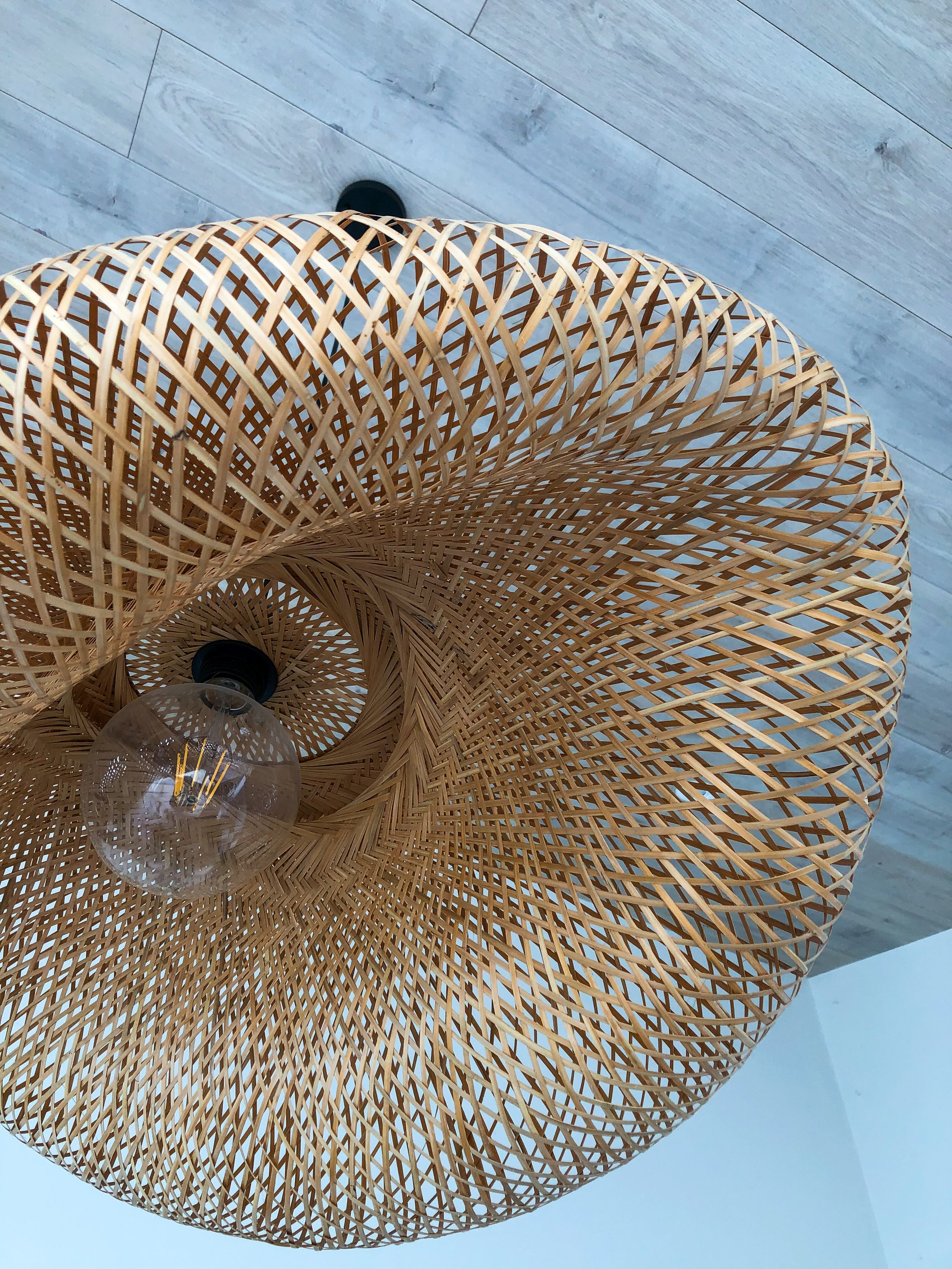 Rattan ceiling pendant in organic shape
