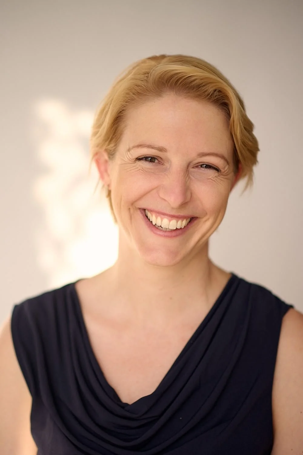Female presenter  photographed in golden light by Chris Henry Photography