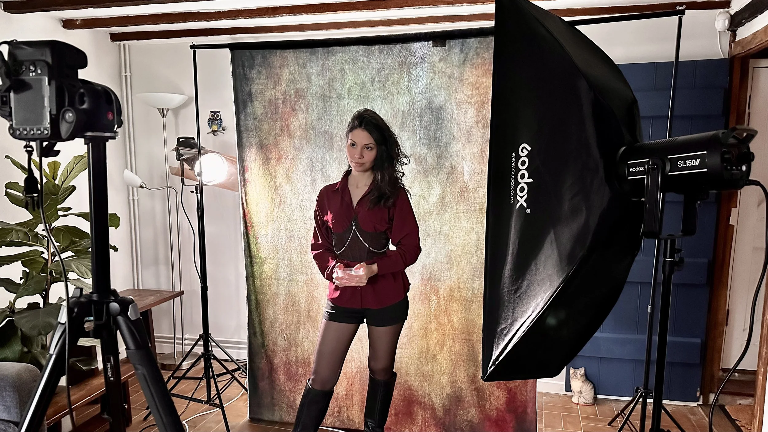 Female actor posing in a home studio in Ashford