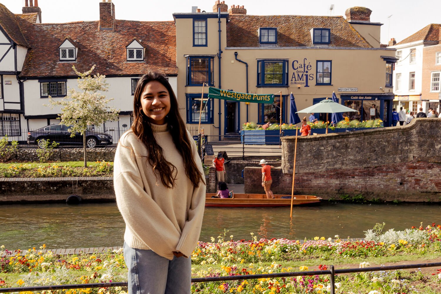 Woman smiling at the camera next to Westgate Punts