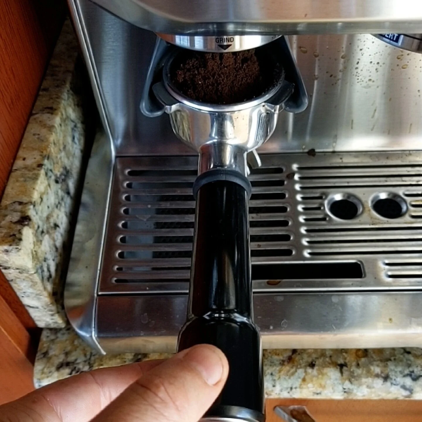 Espresso beans — place under grinder and push once to start, push again to stop