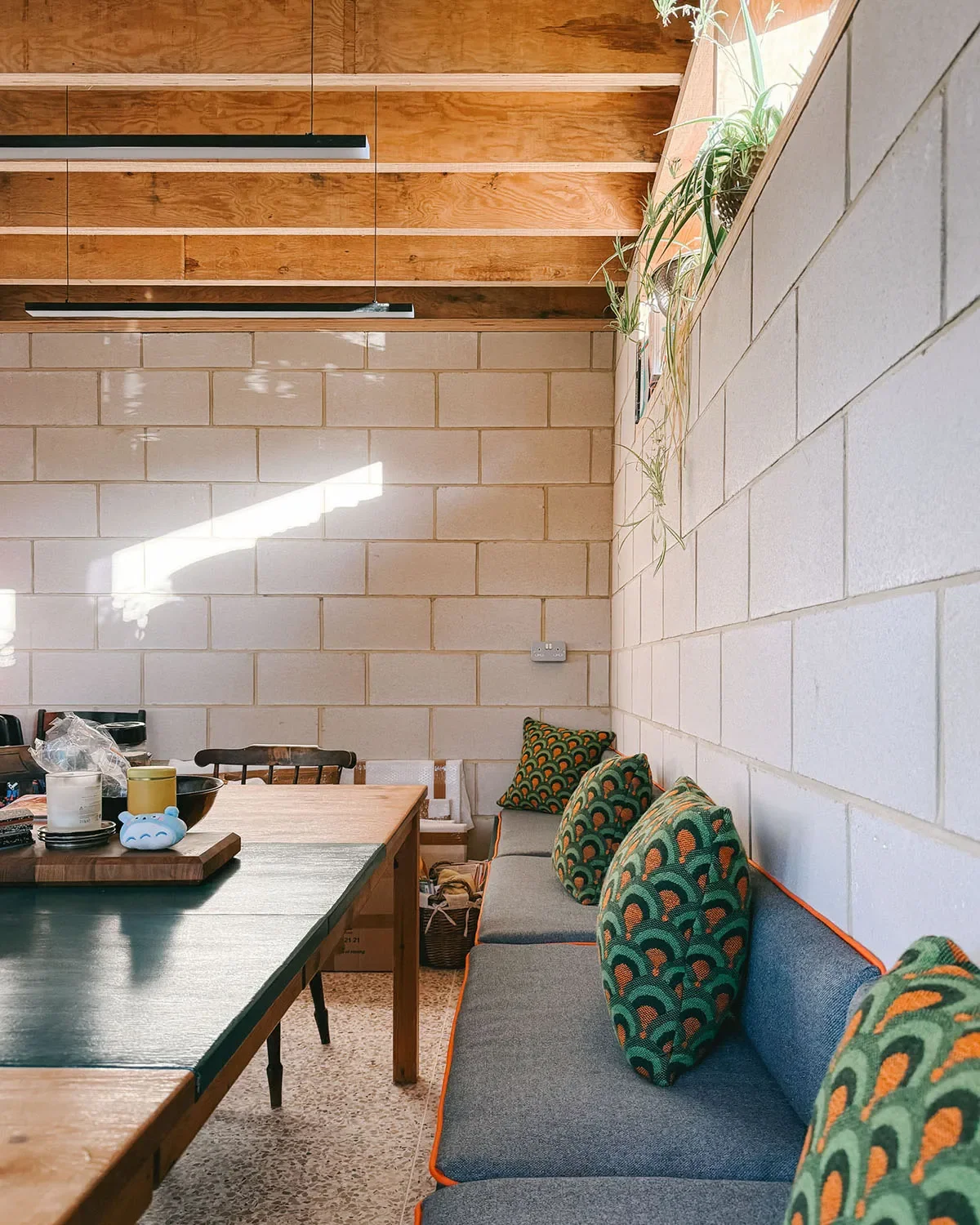 Close up of window, exposed blockwork and LVL timber roof structure. © Andy Matthews Studio