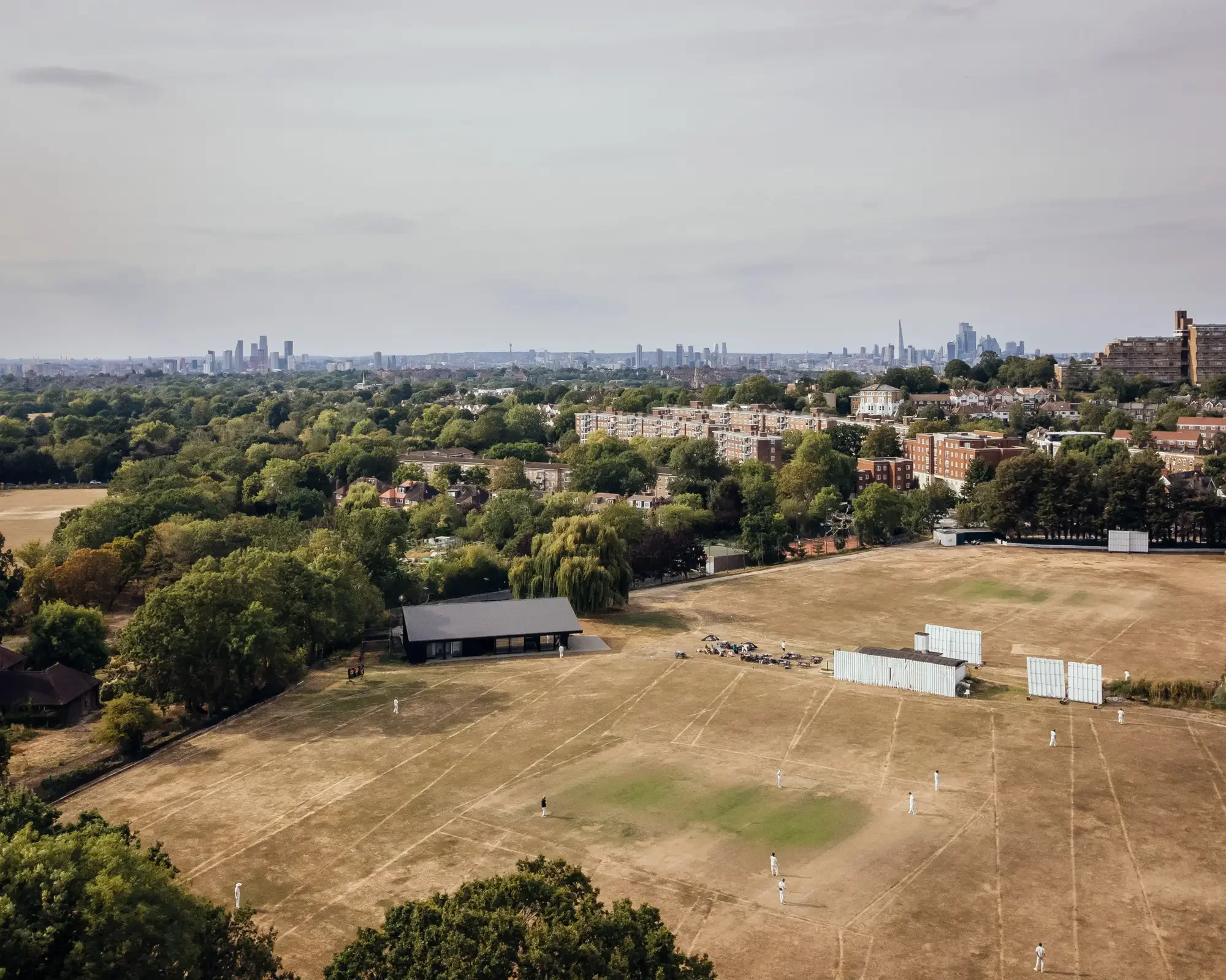 Aerial view of cricket pavilion within wider city setting © Jim Stephenson