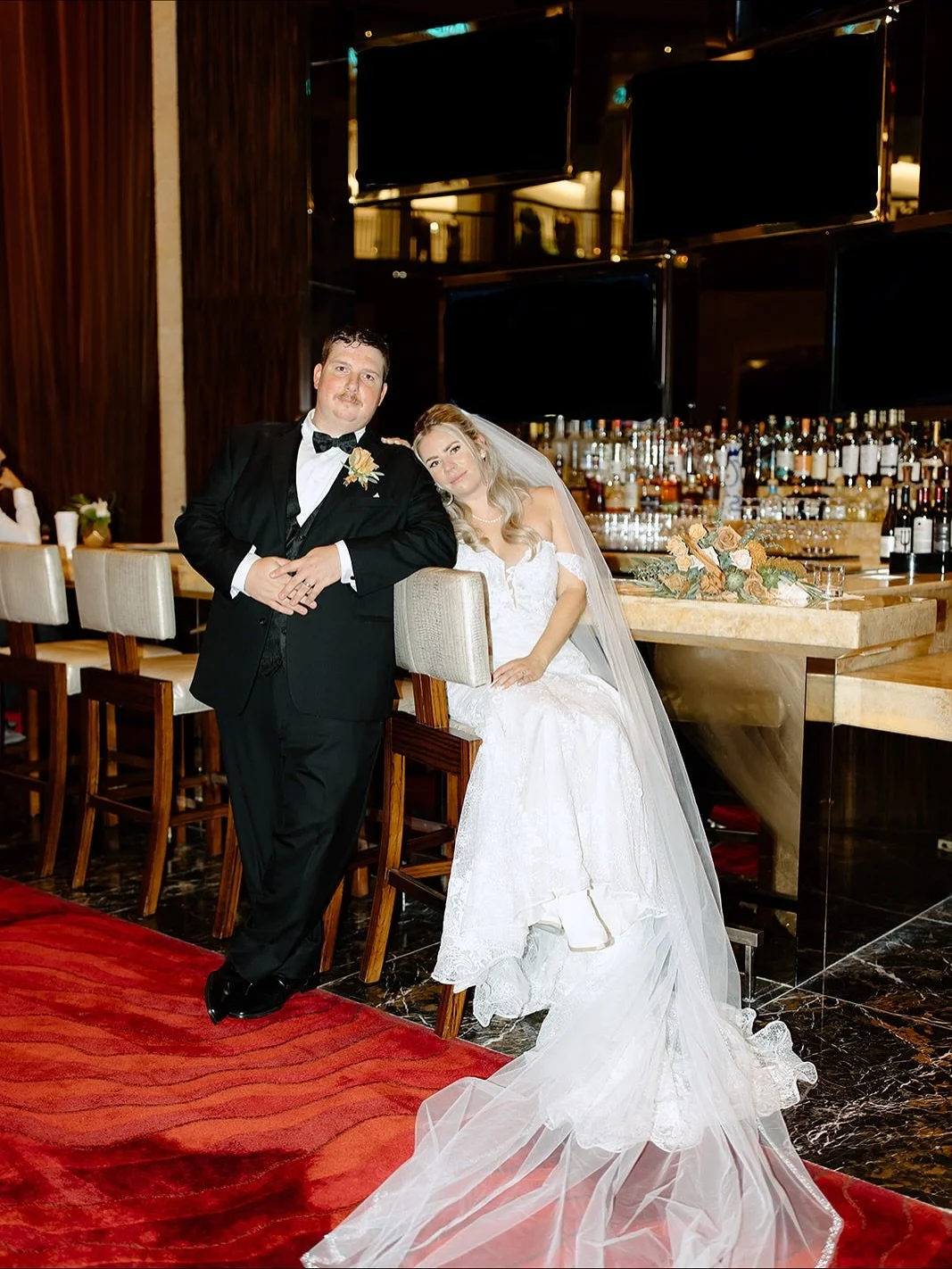 A little country, a little Vegas, and a whole lot of love 🤠✨ These two made bar-side portraits in their boots look effortless! This is just proof that the best wedding photos are the ones that feel just like you! 

Vendor Team:
Planner: @gracefulgat