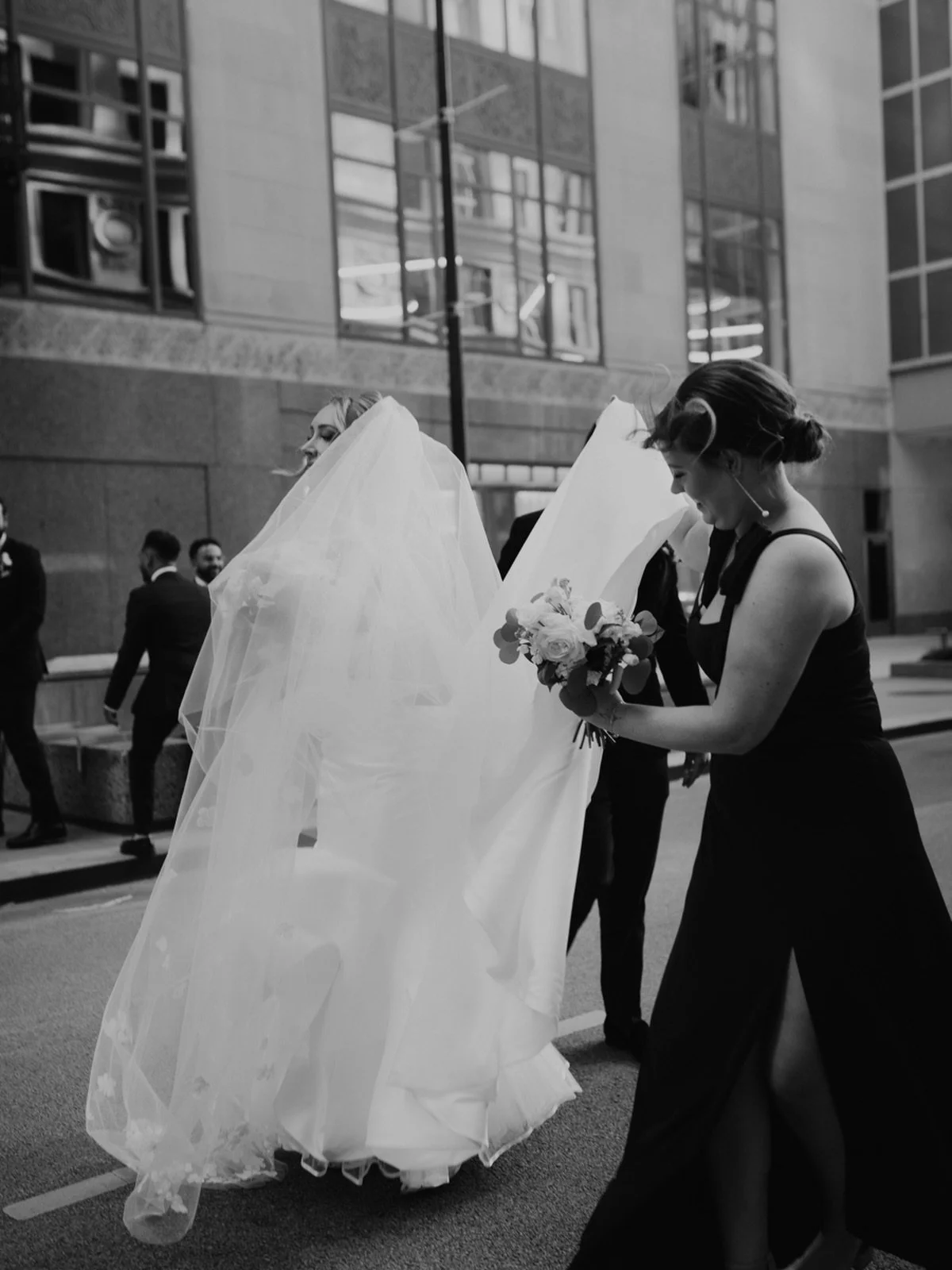 very passionate abt this photo of Rachel and her veil in the wind on the streets of downtown Chicago