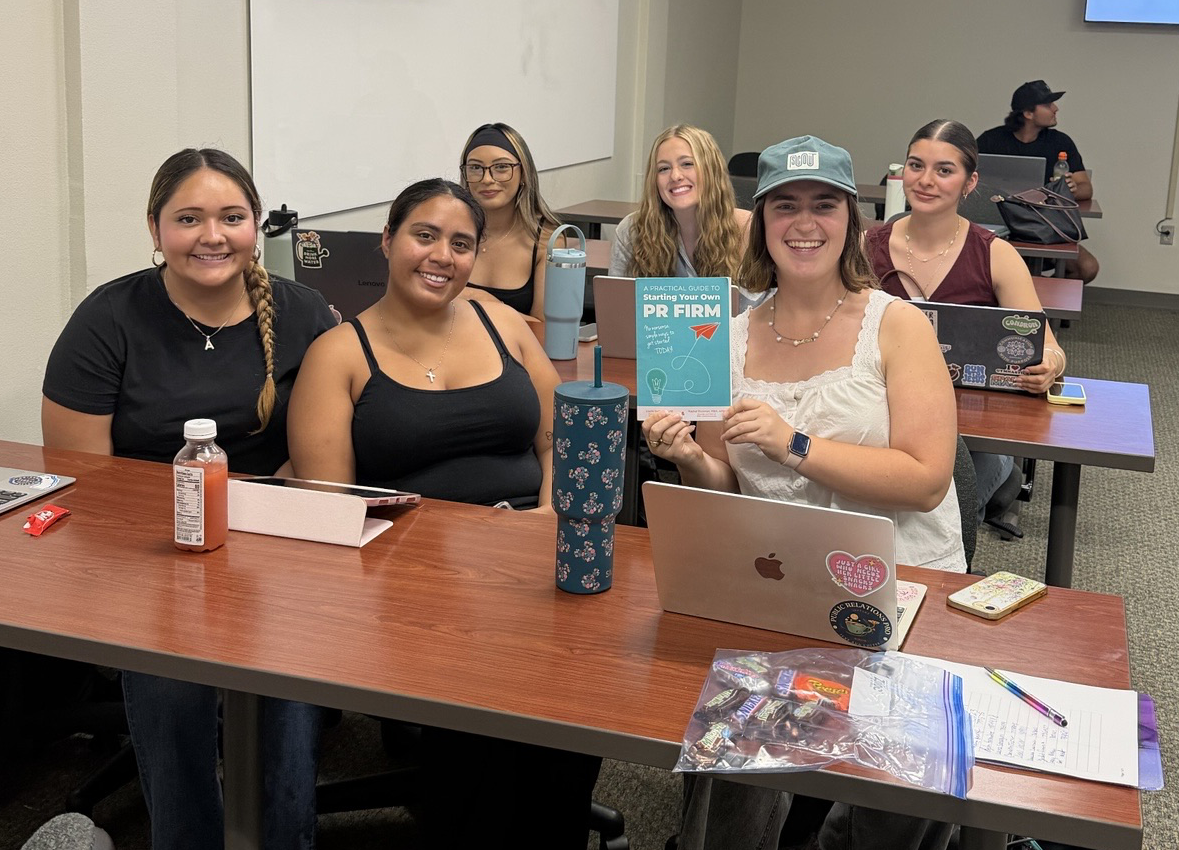 Students at CBU with Rachel and Liselle's book