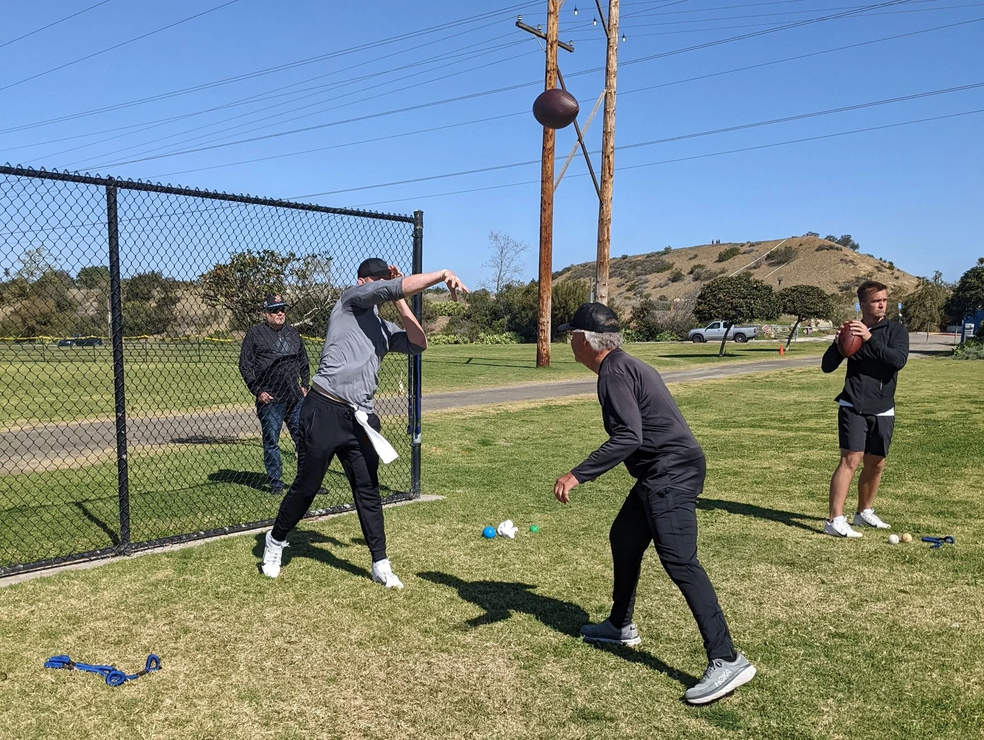 NFL QBs Mac Jones and Sam Ehlinger working with A11 Performance Mentor, Tom House.