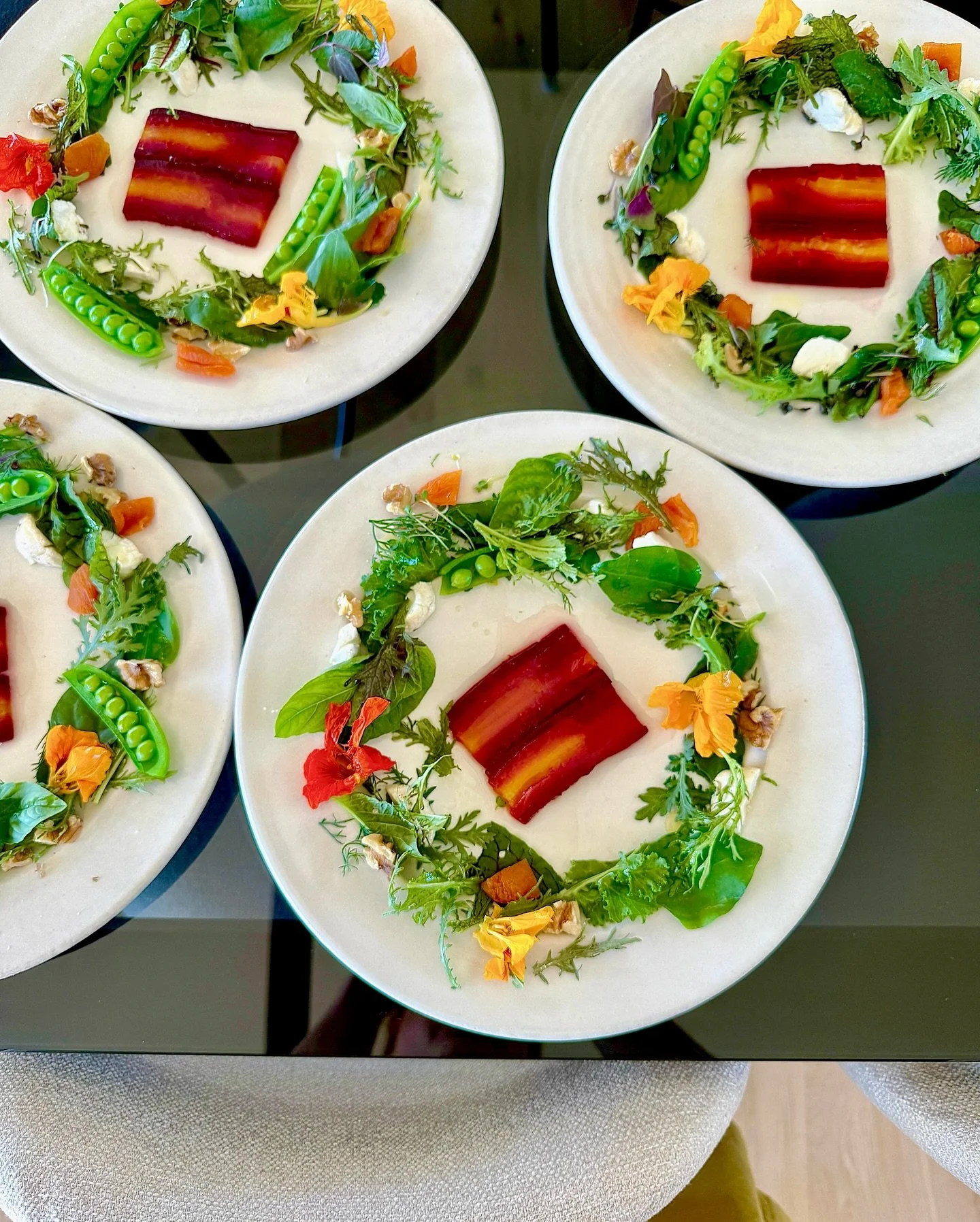 18 layers of compressed rainbow beets and apricot nectar... ch&egrave;vre, walnuts, sous vide five spice apricots, sugar snap peas