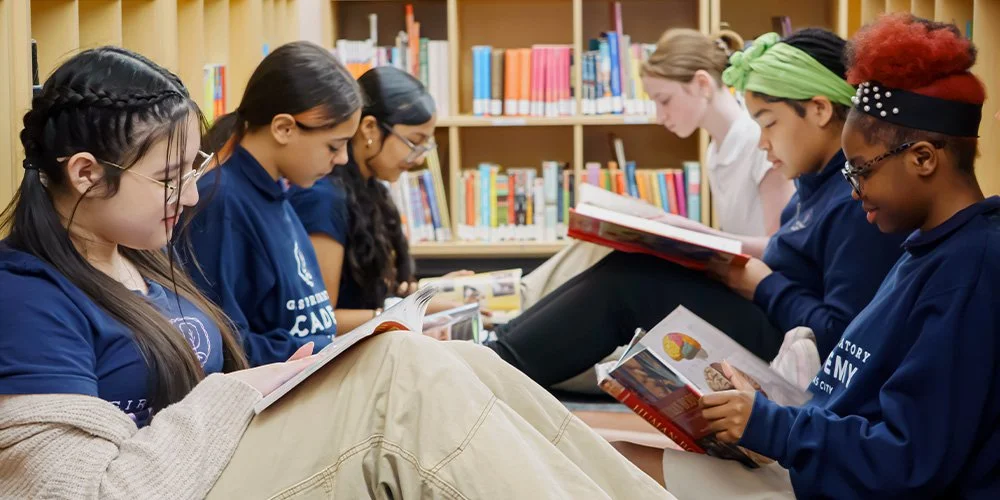 Girls reading in a library