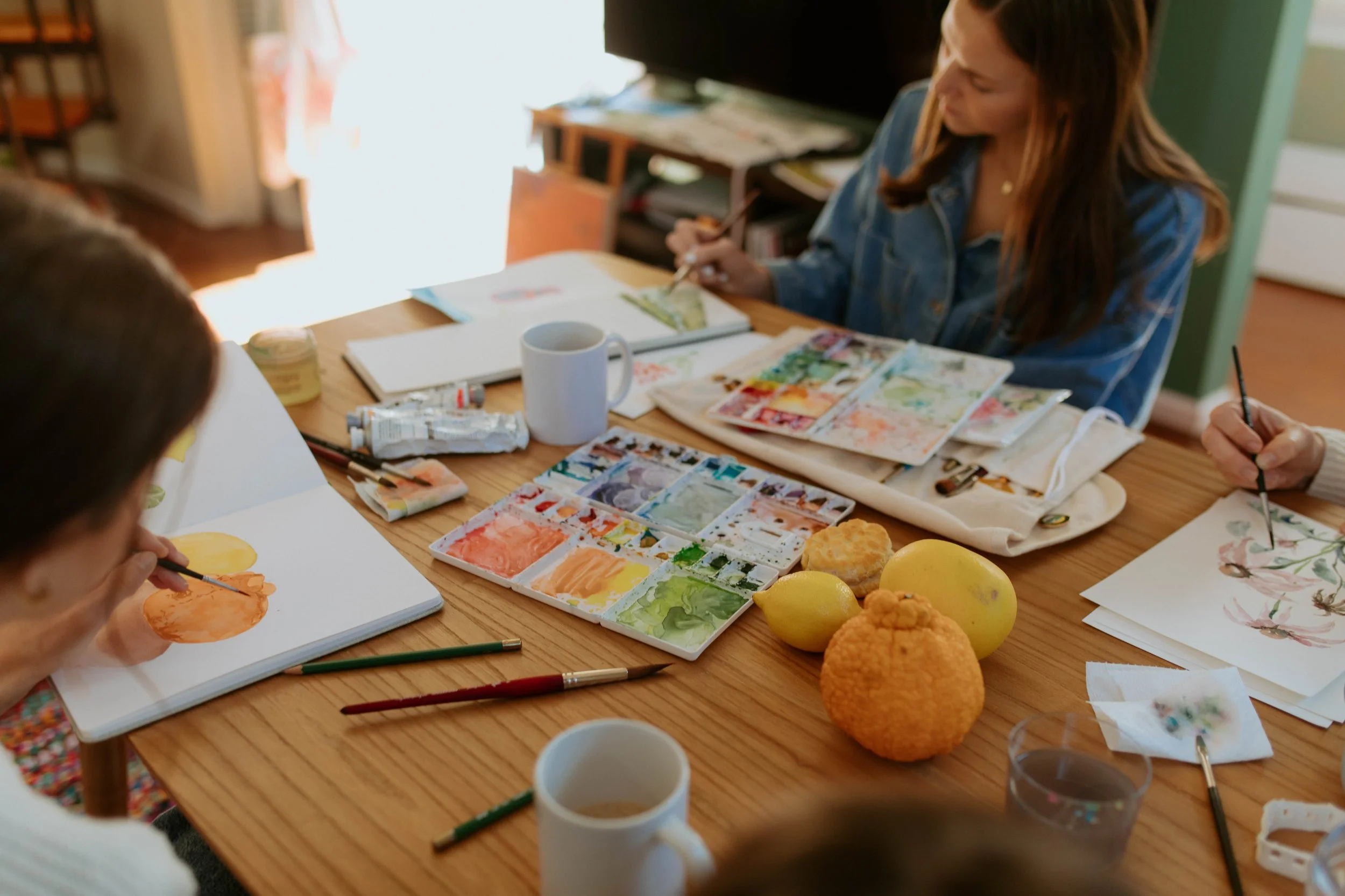 Legacy Studio artists collaborating in Charleston studio