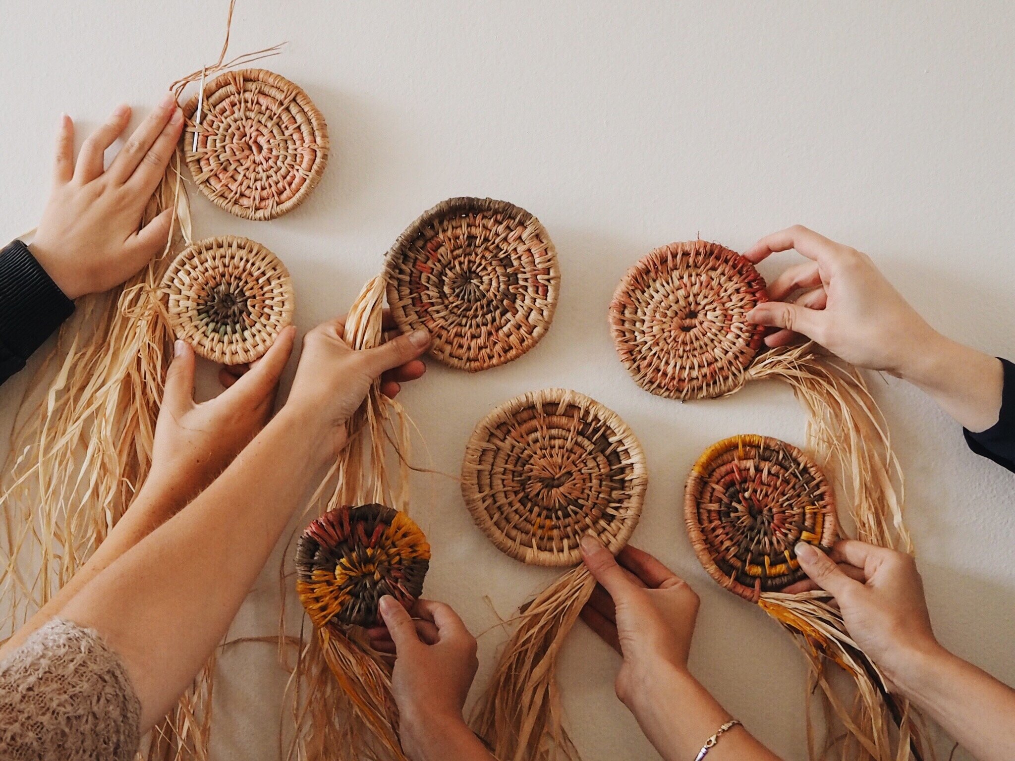 Basket Weaving around a wooden Base and Flower Sticks