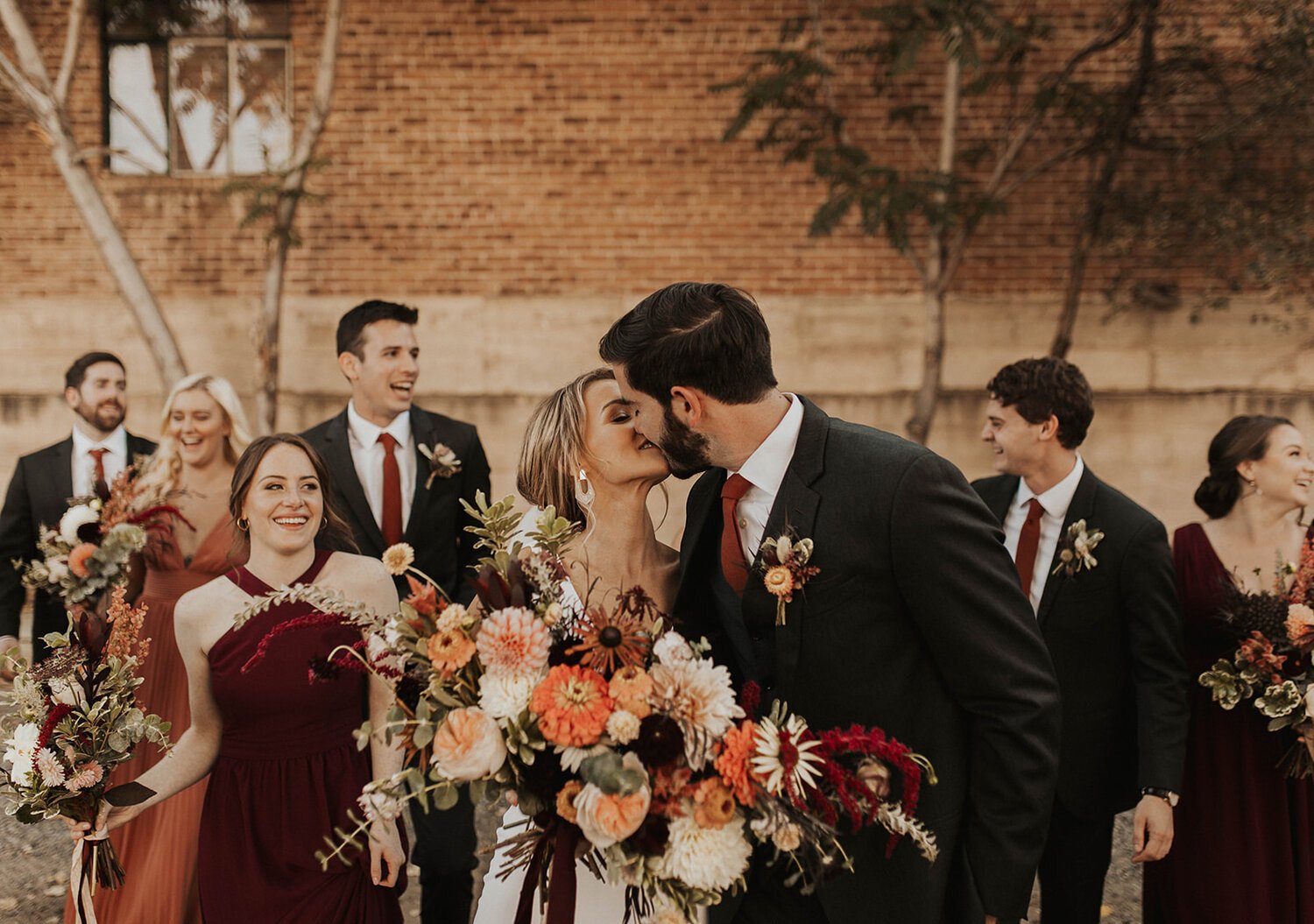 Plume&Furrow-Wedding-Florist-Cloe&Connor-theStVrain-September-Colorado-GracieMariePhoto-bride-groom-kiss.jpg