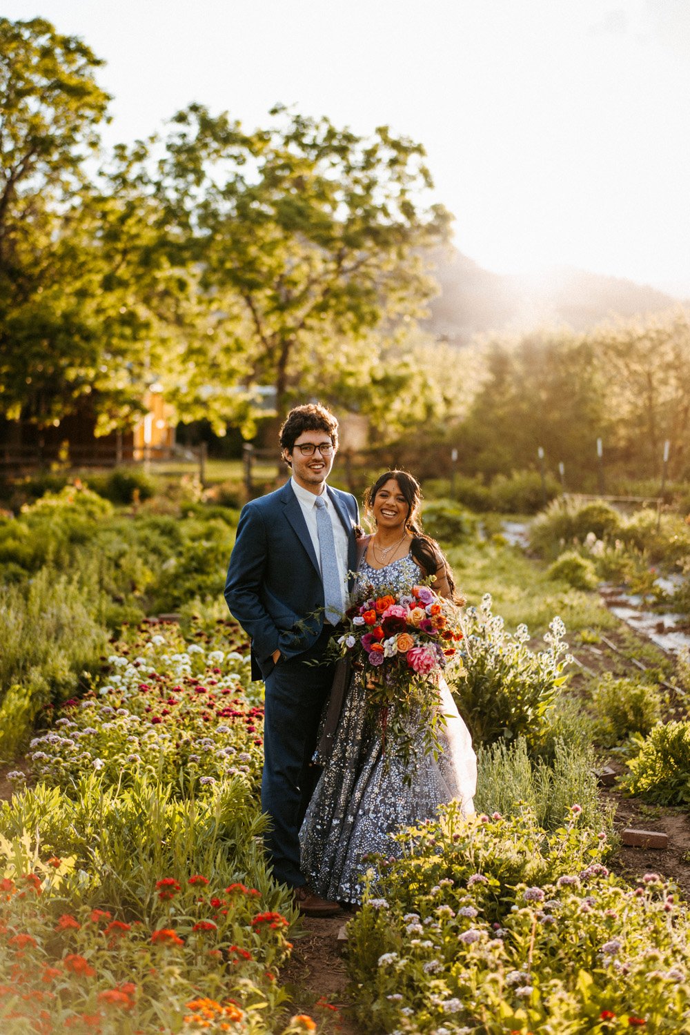 Plume&Furrow-Colorado-Wedding-Florist-Priya&Andrew-MalloryMunsenPhoto-Lyons-Farmette-May-bride-groom-portrait-flower-farm.jpg