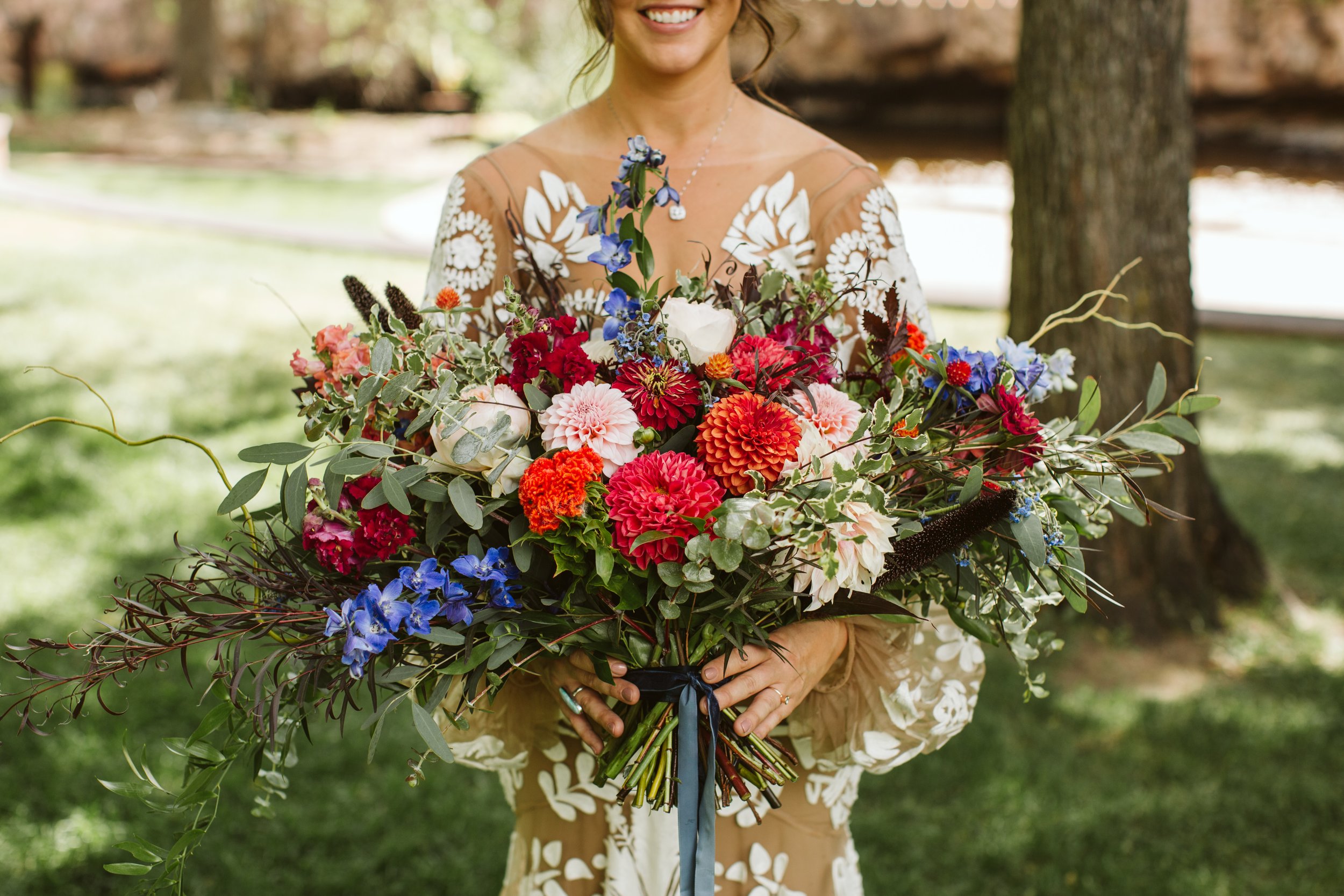 Plume&Furrow-Wedding-Florist-Kayla&Scott-AdamHouseman-River-Bend-September-Colorado-Bride-Oversized-Bridal-Bouquet.jpg