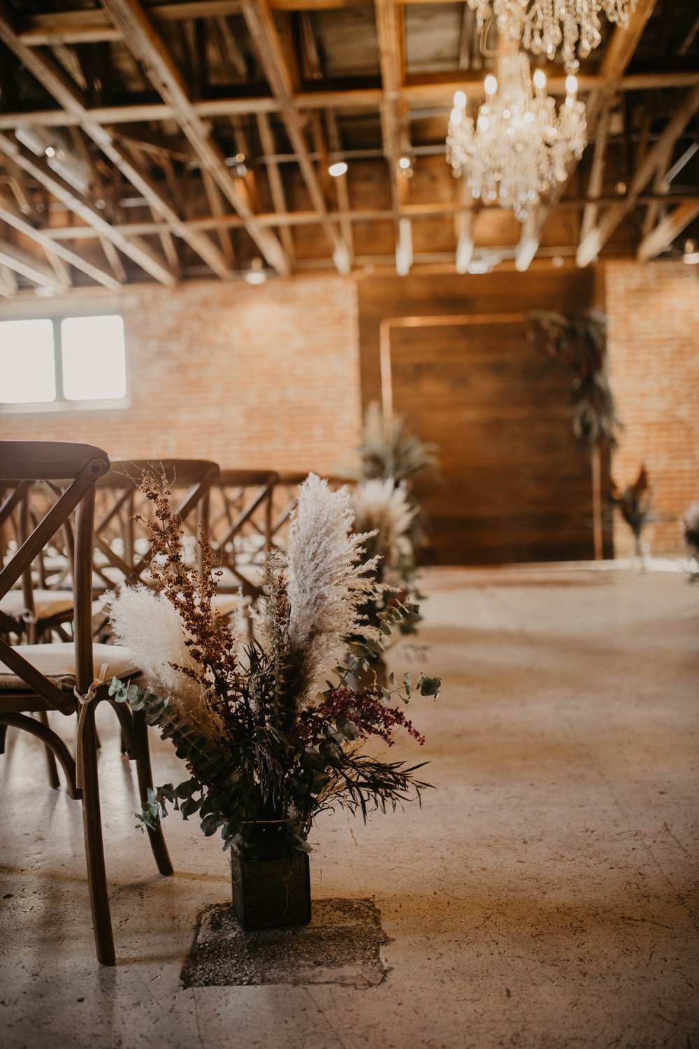 Plume&Furrow-Wedding-Florist-Cloe&Connor-theStVrain-September-Colorado-GracieMariePhoto-details-aisle-flower-arrangement.jpg