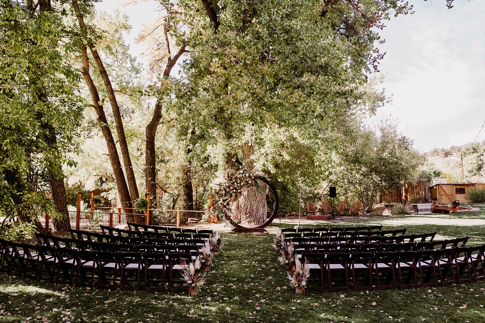 Plume&Furrow-WeddingFlorist-Garrison&Gabriella-TaylerCarlisle-Lyons-Farmette-October-Colorado-Ceremony-Layout-Decor-Chairs.jpg