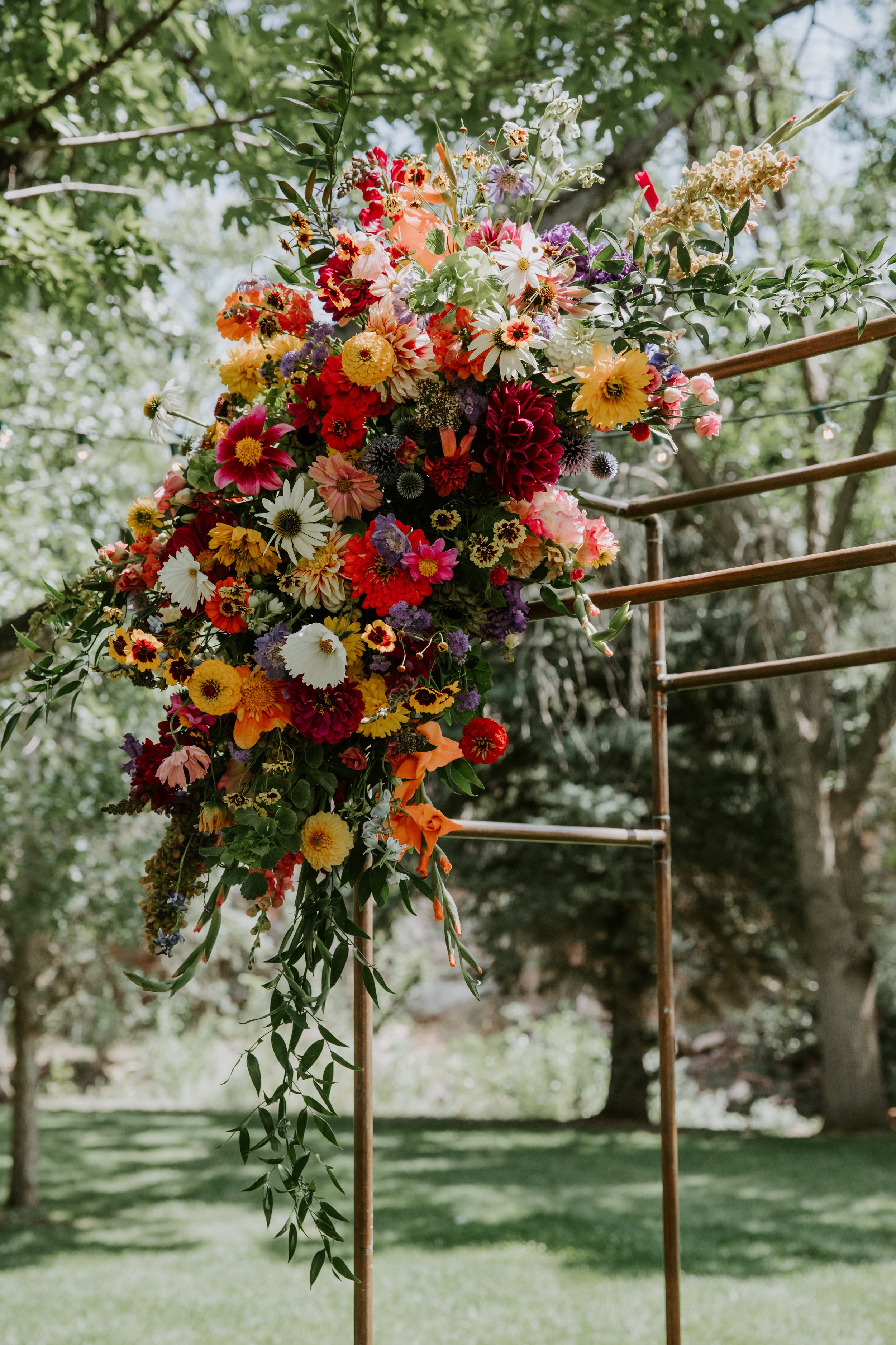 Plume&Furrow-Wedding-Florist-Sarah&Jordan-AshleyTiedgenPhotography-River-Bend-August-Colorado-Arbor-Flower-Decor.jpg