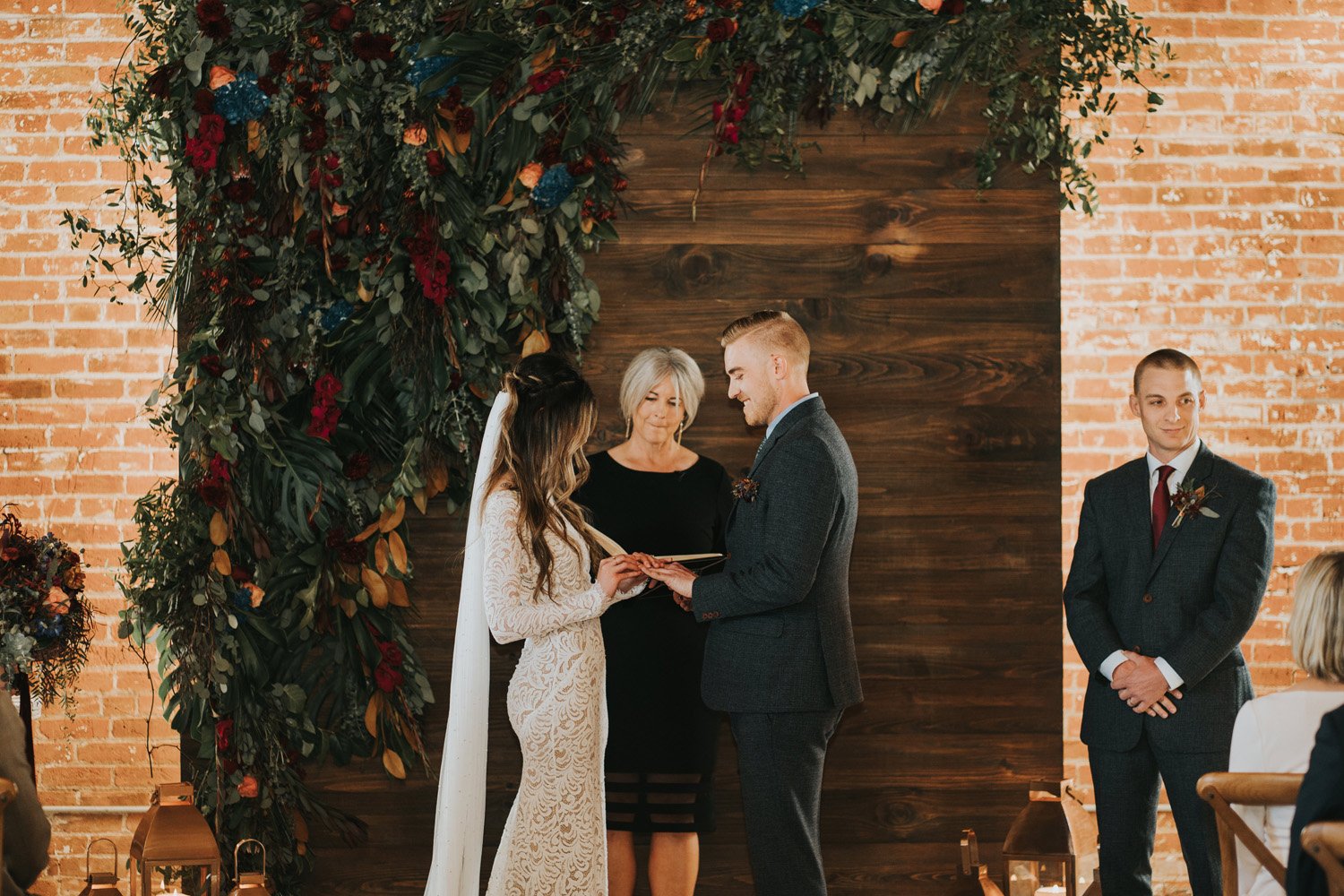 Plume&Furrow-Wedding-Florist-Kaiti&Joe-theStVrain-May-Colorado-JillHouserPhoto-ceremony-floral-backdrop-vows.jpg