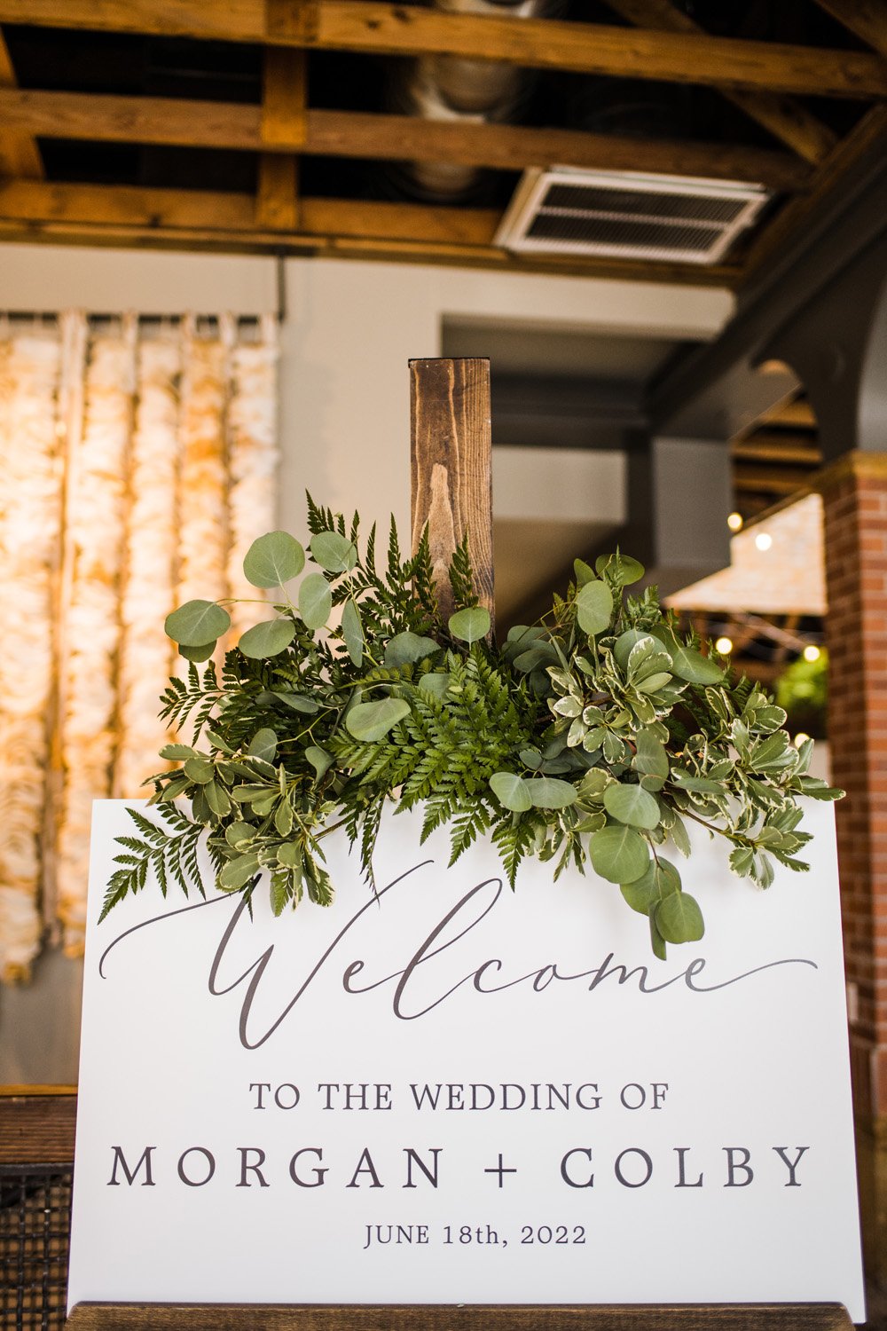 Plume&Furrow-Wedding-Florist-Morgan&Colby-theStVrain-June-Colorado-Function+FlourishPhoto-details-welcome-greenery-arrangement.jpg