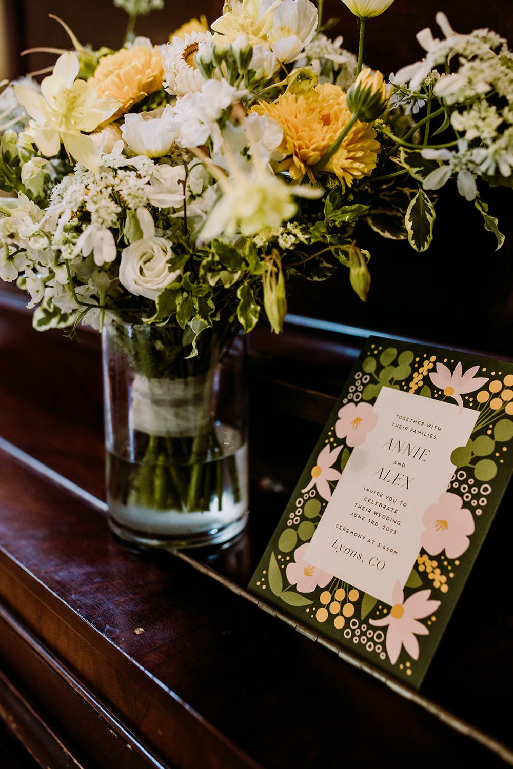 Plume&Furrow-Wedding-Florist-Annie&Alex-Lyons-Farmette-Colorado-TaylerCarlisle-bouquet-on-piano-and-invitation.jpg