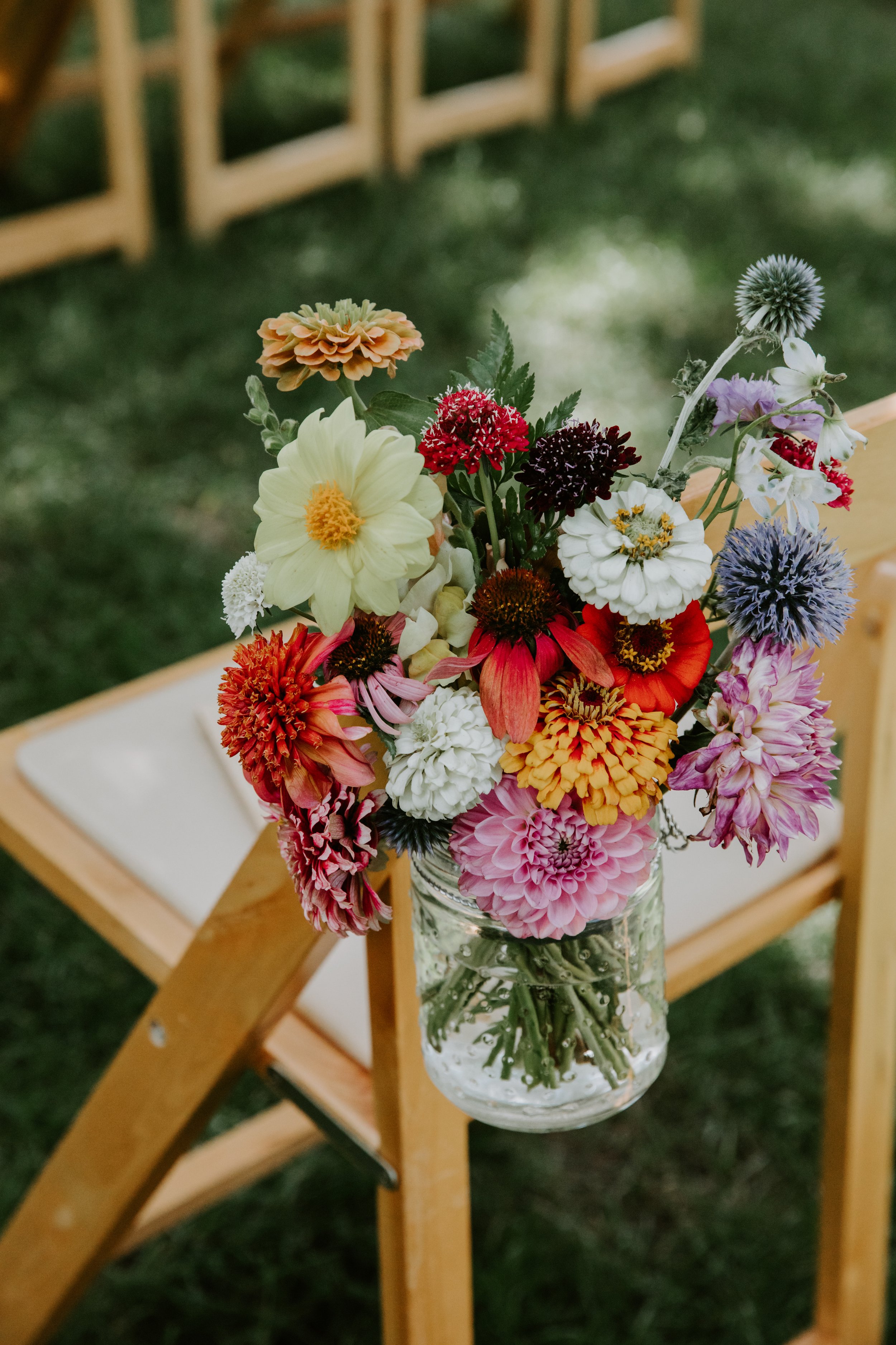 Plume&Furrow-Wedding-Florist-Sarah&Jordan-AshleyTiedgenPhotography-River-Bend-August-Colorado-Chair-Decor.jpg