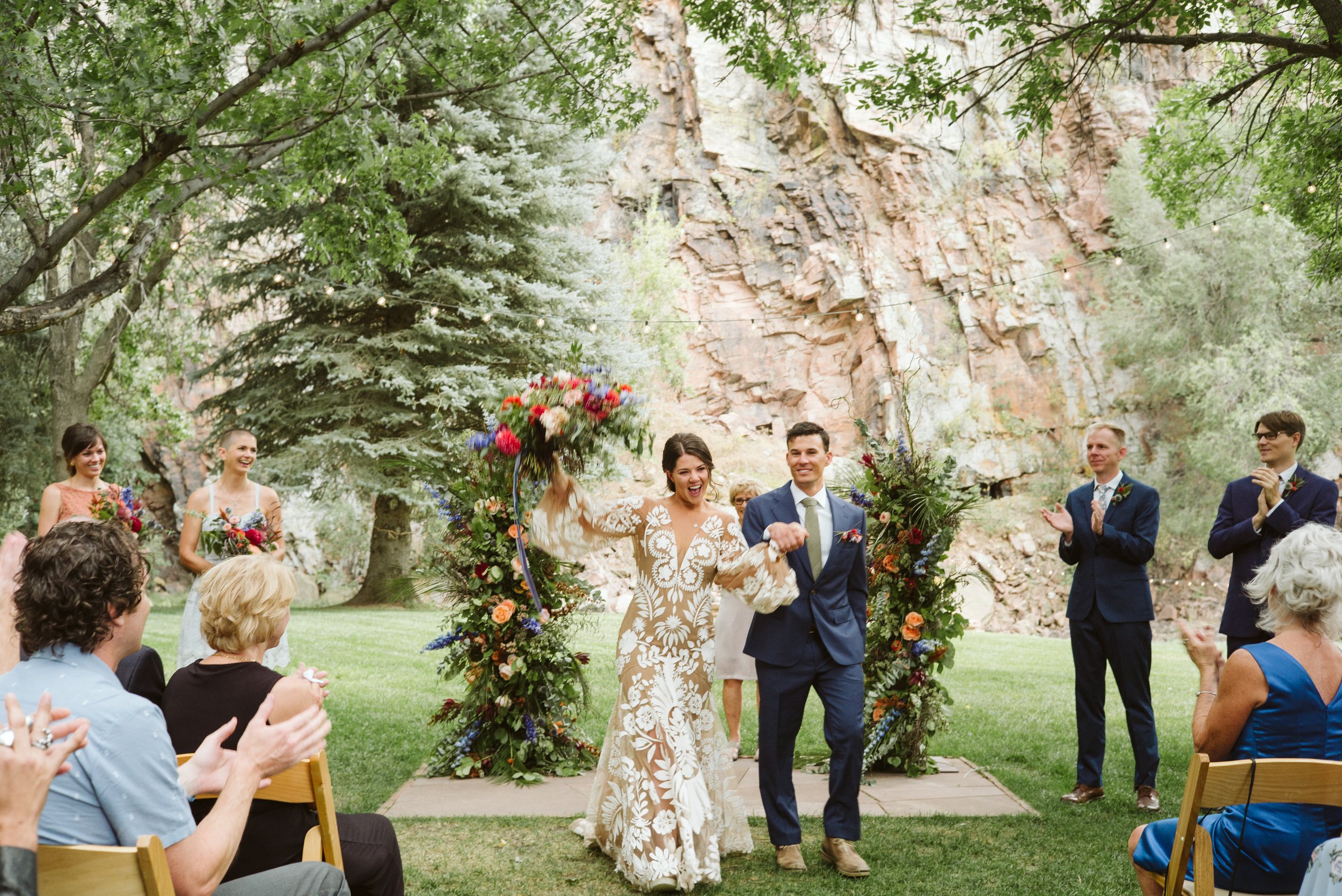 Plume&Furrow-Wedding-Florist-Kayla&Scott-AdamHouseman-River-Bend-September-Colorado-Bride-Groom-Recessional.jpg