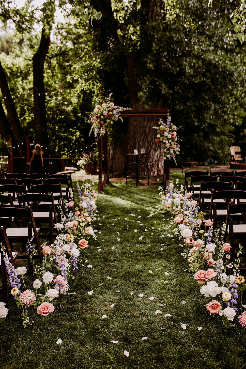 Plume&Furrow-Colorado-Wedding-Florist-Emily&Charlie-TaylerCarlislePhoto-Farmette-September-ceremony-arbor-aisle-decor.jpg