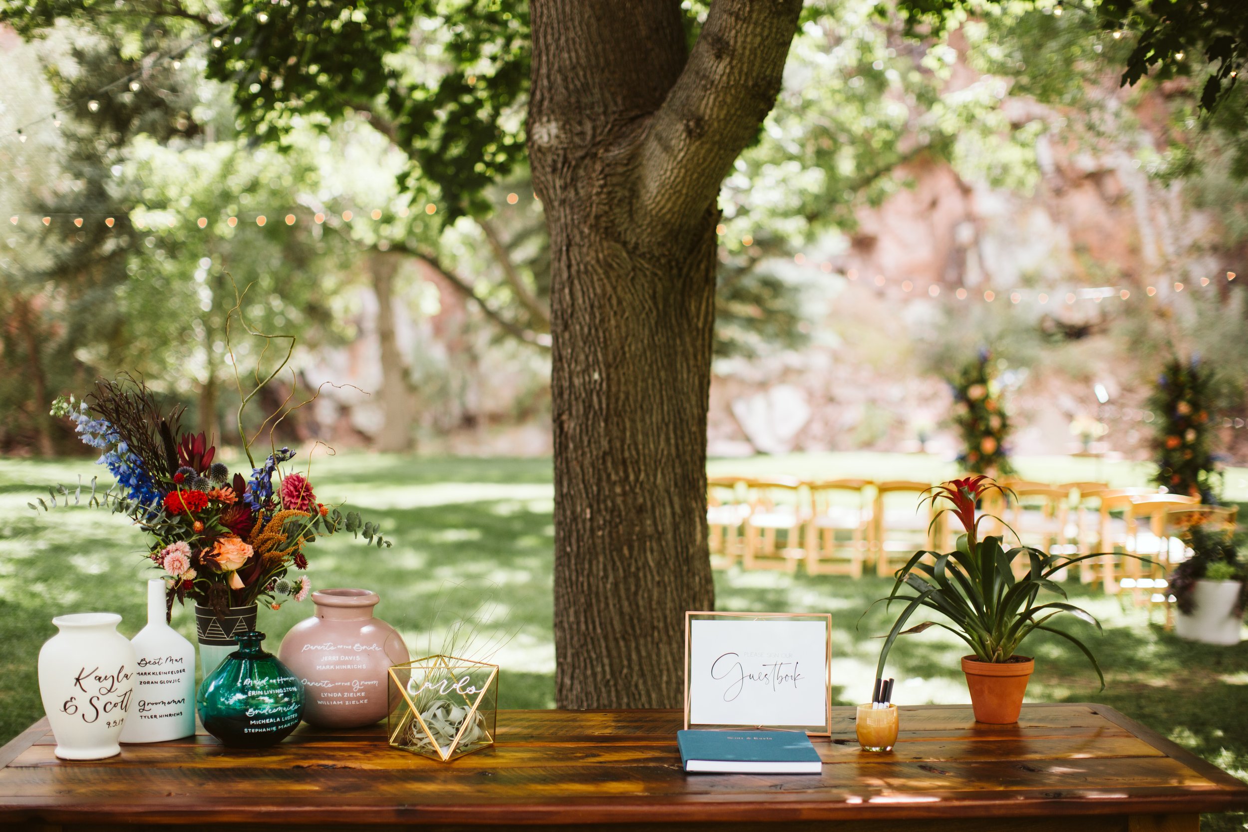 Plume&Furrow-Wedding-Florist-Kayla&Scott-AdamHouseman-River-Bend-September-Colorado-Welcome-Table-Flower-Arrangements.jpg