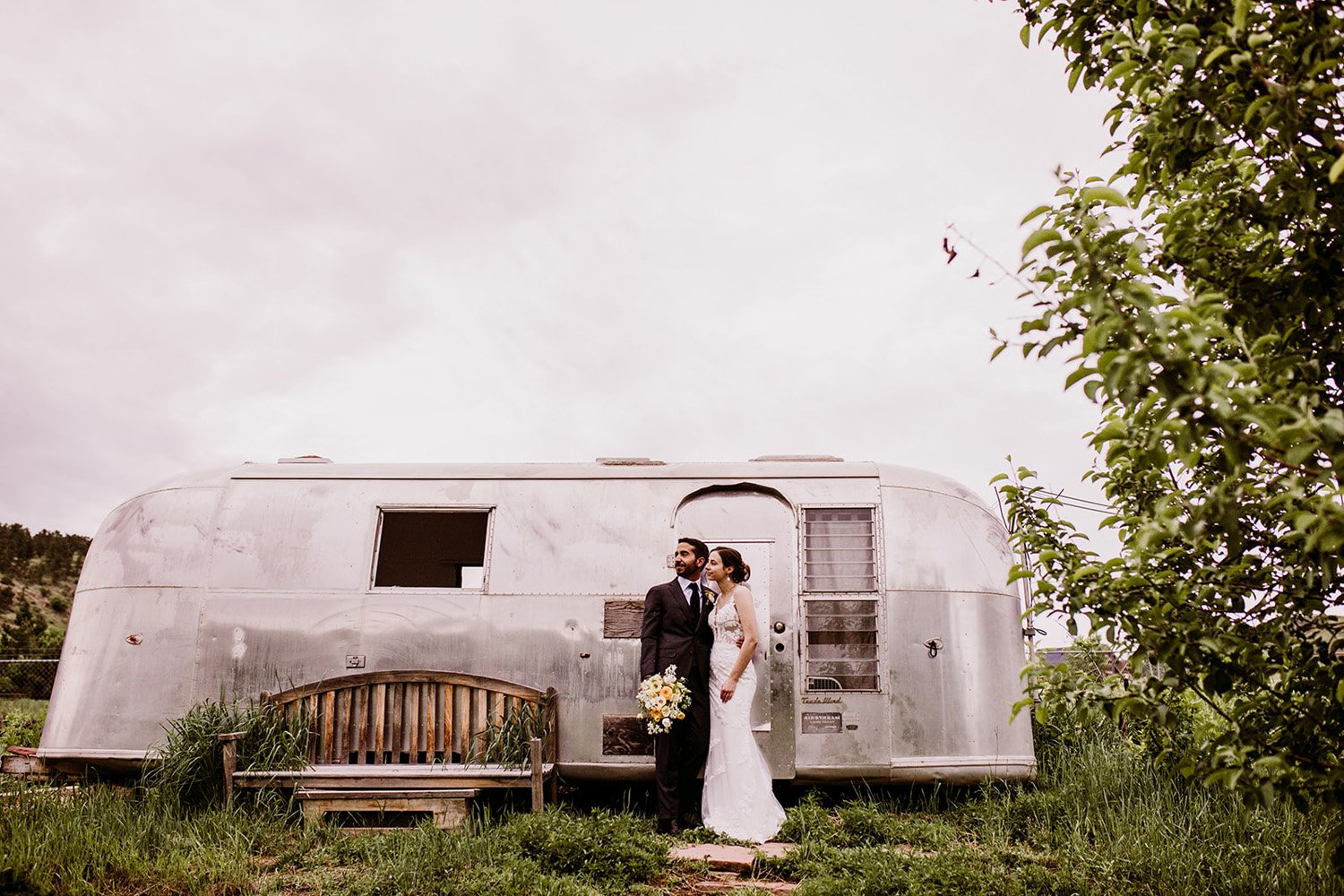 Plume&Furrow-Wedding-Florist-Annie&Alex-Lyons-Farmette-Colorado-TaylerCarlisle-airstream-bride-groom-portrait.jpg