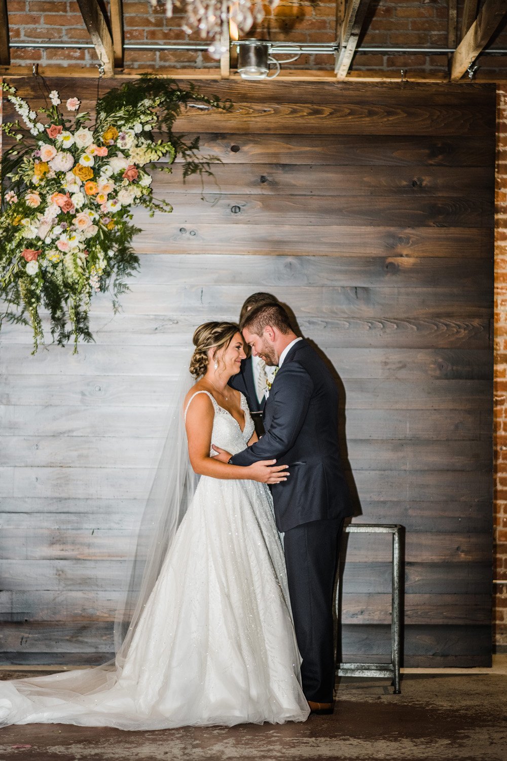 Plume&Furrow-Wedding-Florist-Morgan&Colby-theStVrain-June-Colorado-Function+FlourishPhoto-ceremony-bride-groom-moment-flowers-arbor.jpg