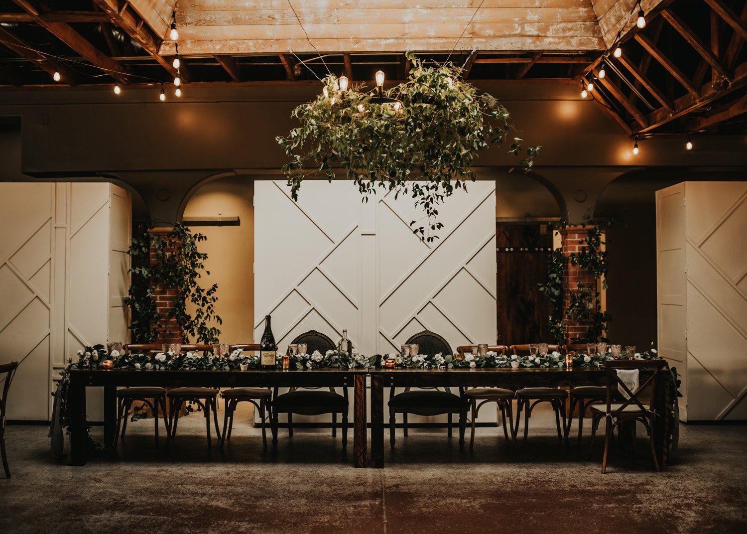 Plume&Furrow-Wedding-Florist-MC&Jamie-theStVrain-August-Colorado-SamanthaRuscherPhoto-head-table-greenery-installation.jpg