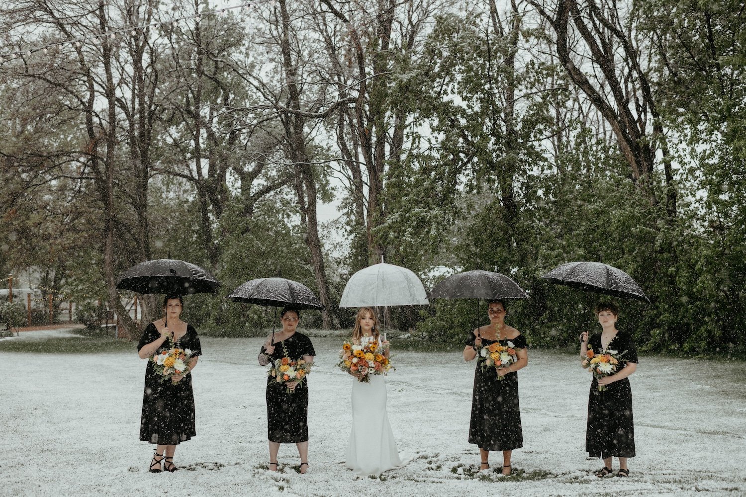 Plume&Furrow-Wedding-Florist-Alex&Corey-Lyons-Farmette-Colorado-Kenz+Nick-bridesmaids-bouquets-in-the-snow.jpg