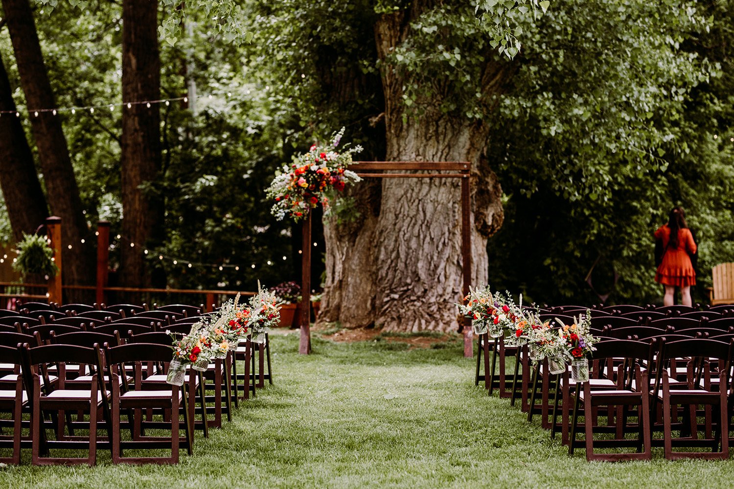 Plume&Furrow-Wedding-Florist-Annie&Alex-Lyons-Farmette-Colorado-TaylerCarlisle-ceremony-aisle-arbor-flowers.jpg