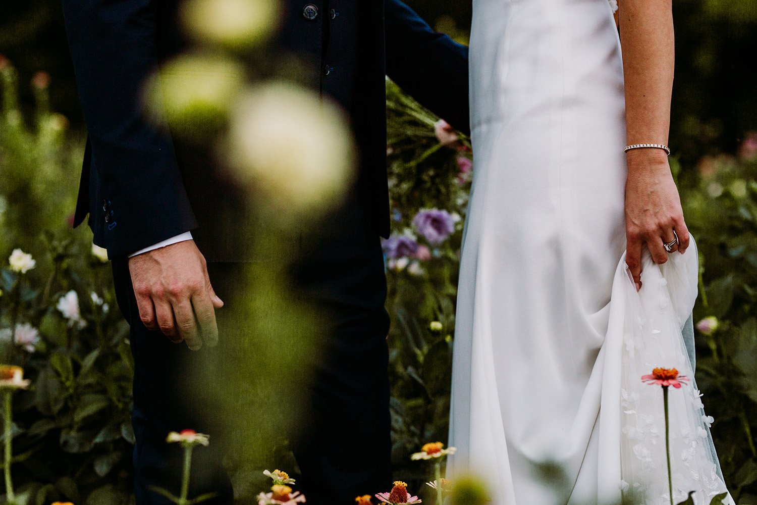 Plume&Furrow-Colorado-Wedding-Florist-Emily&Charlie-TaylerCarlislePhoto-Farmette-September-bride-groom-field-flowers-detail.jpg