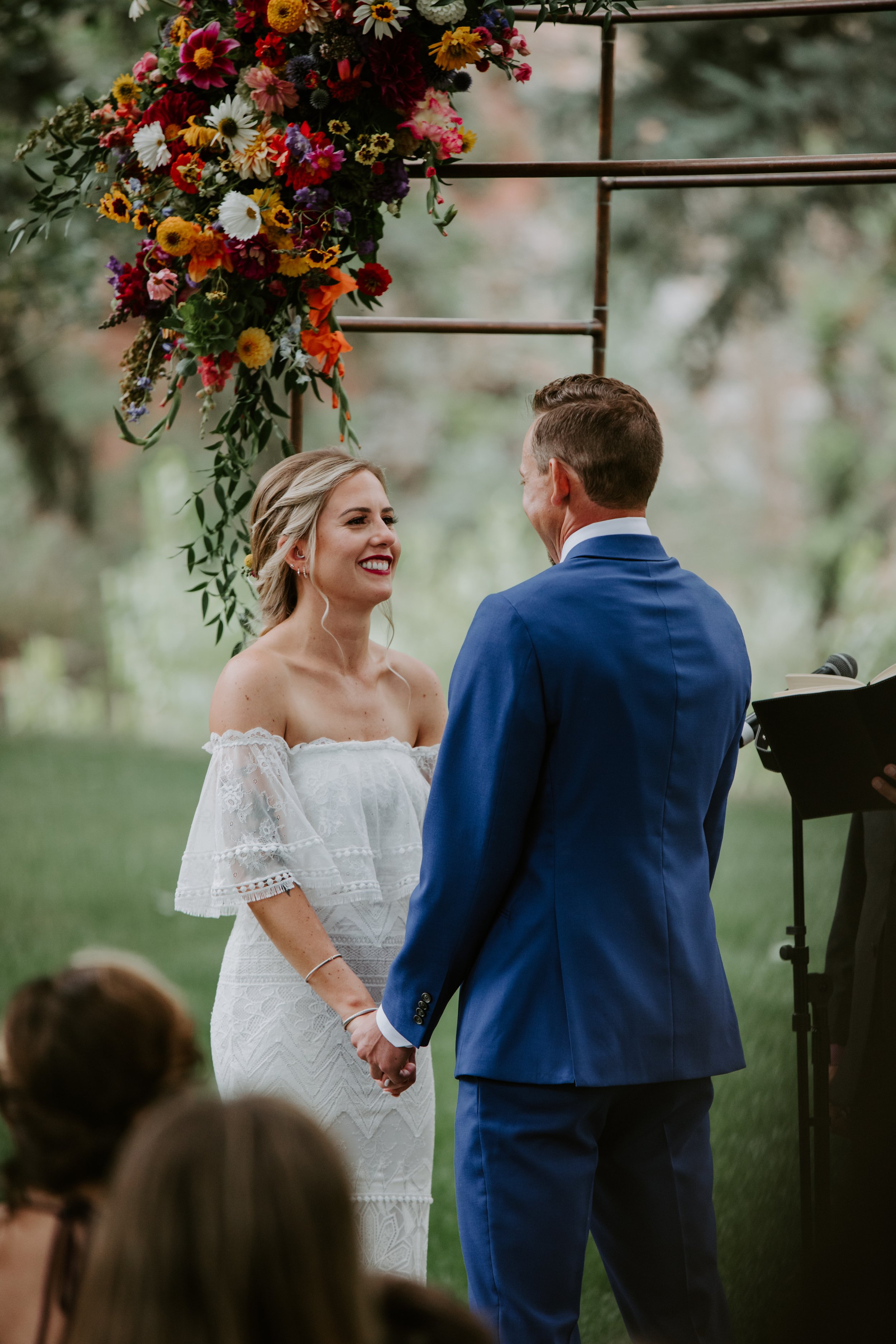 Plume&Furrow-Wedding-Florist-Sarah&Jordan-AshleyTiedgenPhotography-River-Bend-August-Colorado-Bride-Groom-Arbor-Decor.jpg