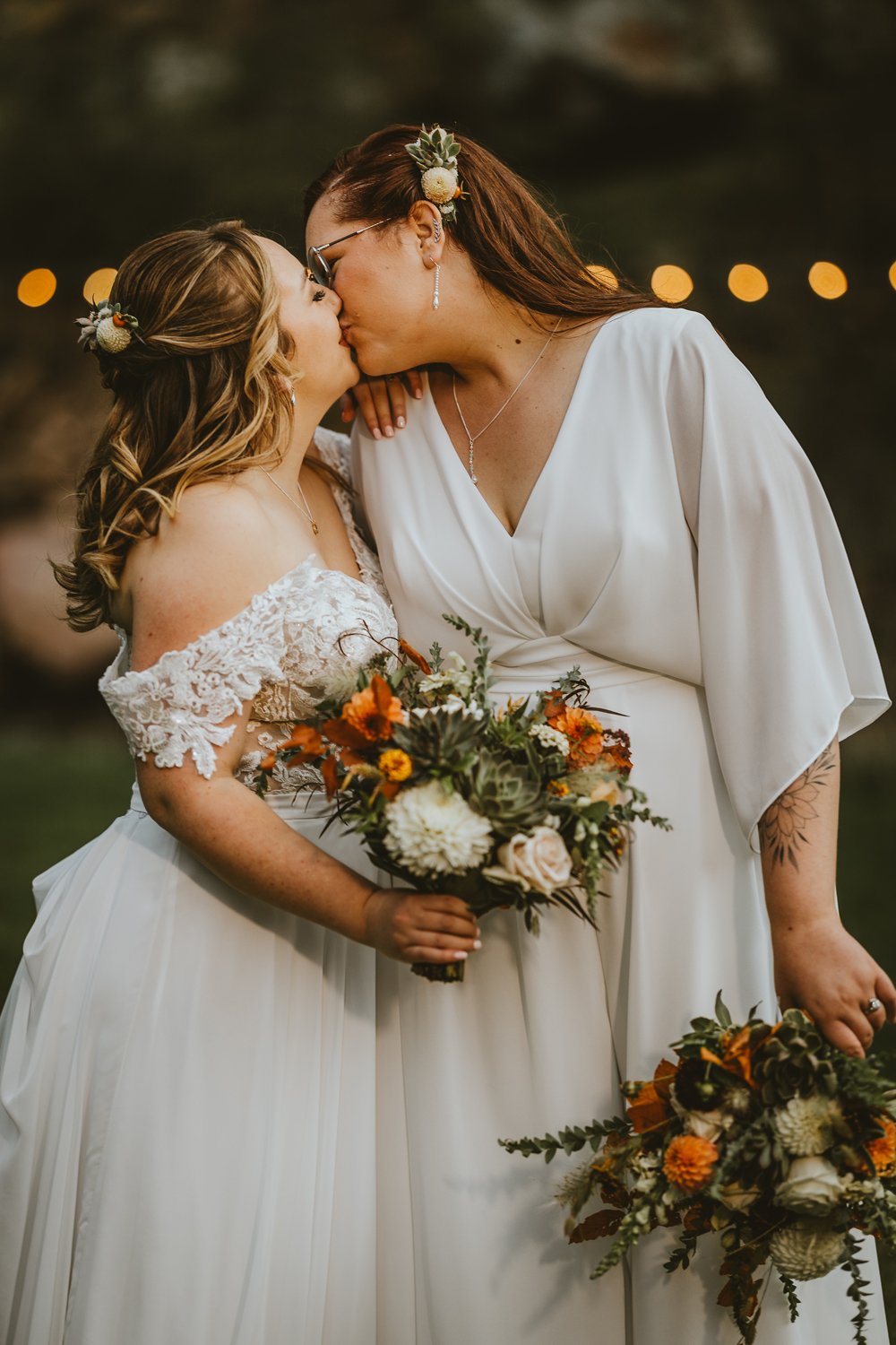 Plume&Furrow-Wedding-FLorist-Kennedy&Jena-IvyBencheckPortraits-River-Bend-LGBTQ-September-Colorado-Brides-Kiss-Bridal-Bouquets-2.jpg